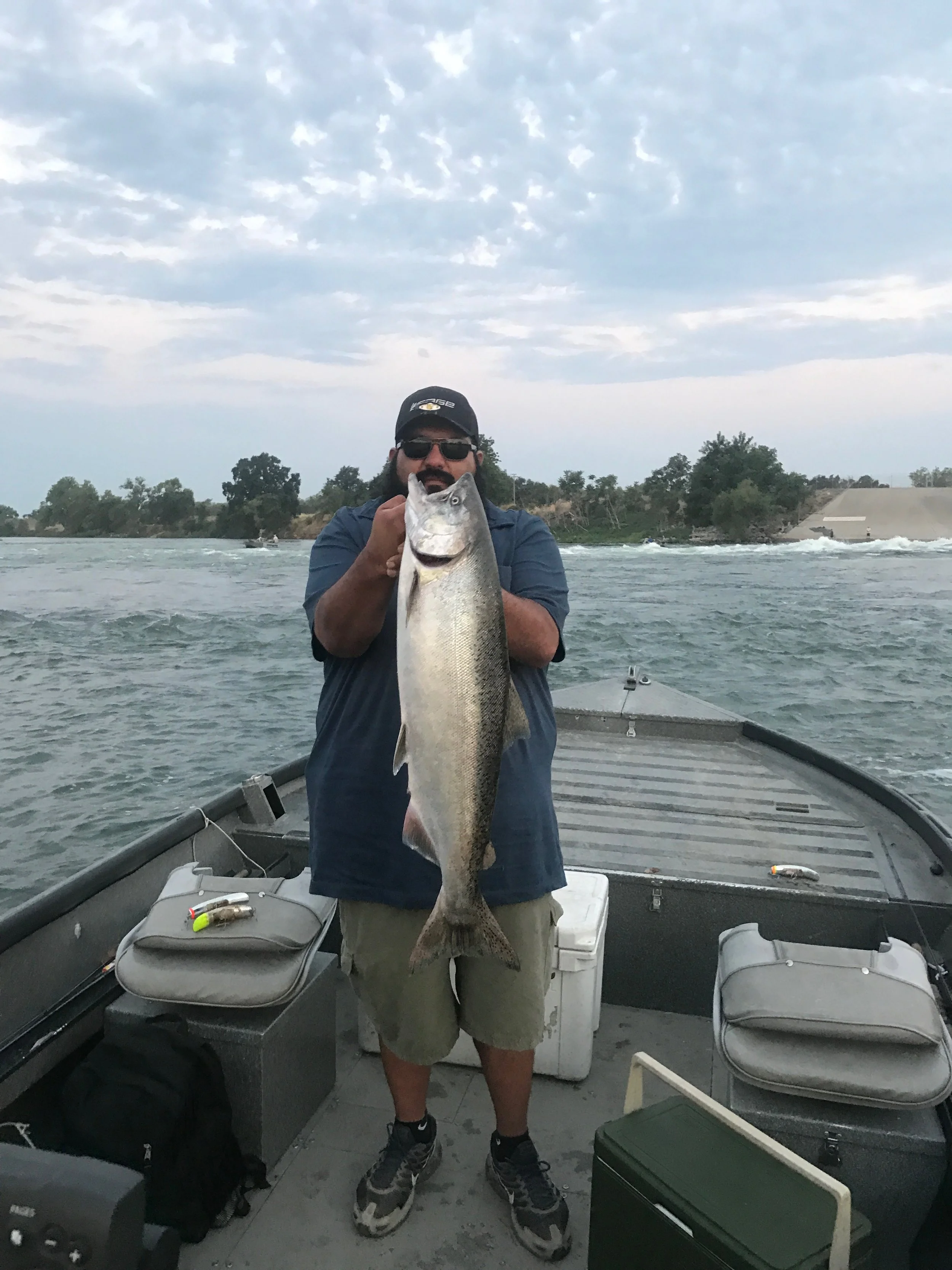 Oscar Nerey with a dime bright Feather River king salmon.