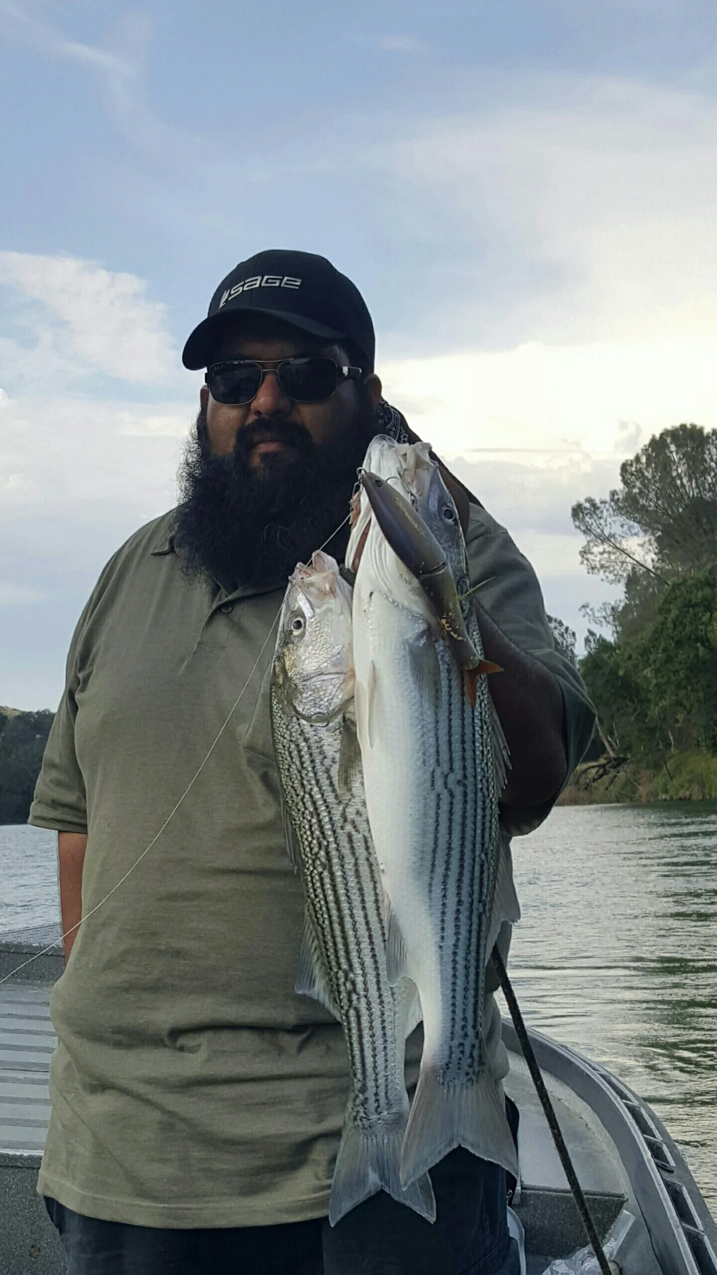 Oscar Nerey With A Quick Limit Of "Sneaky Pete" Striped Bass