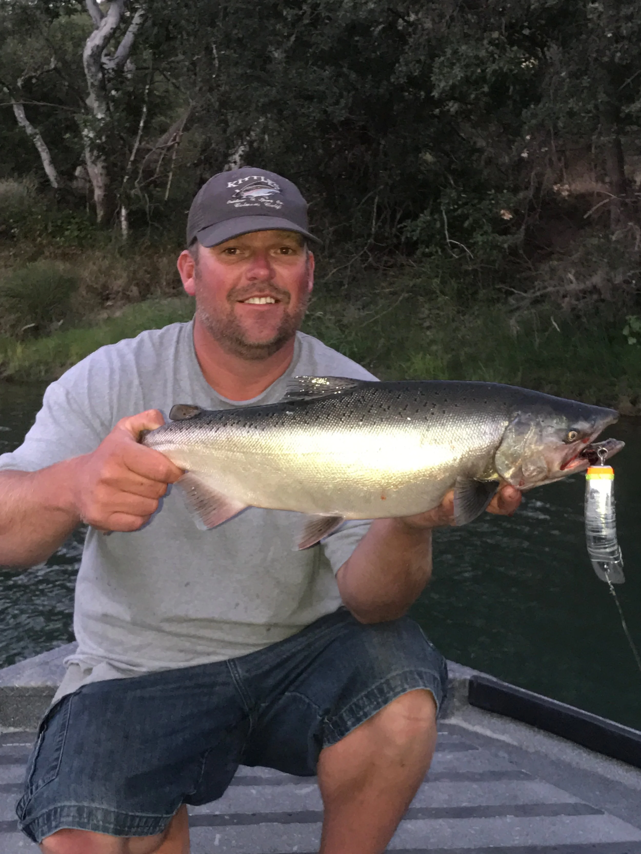 Salmon fishing guide Mike Rasmussen with a two year old chinook salmon he caught on the Sacramento River on August 14, 2017 while back bouncing kwikfish with a sardine wrap.