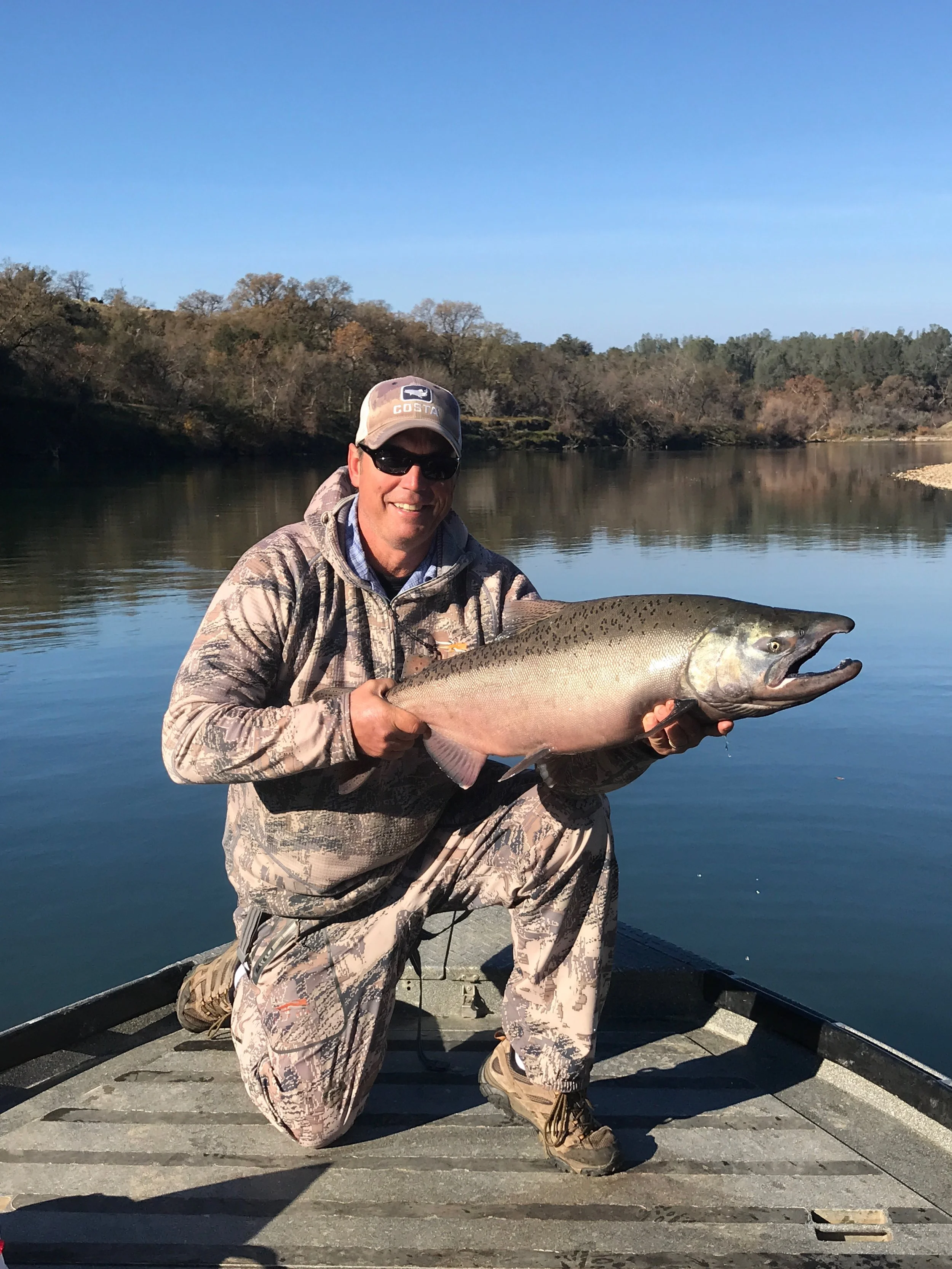 Dave Jacobs holding yet another chrome Late Fall Run Chinook Salmon he caught in the closing days of what could be considered one of the best Late Fall Run's in many years on the Sacramento River. Still using a green-billed lure to do work with after all these years...
