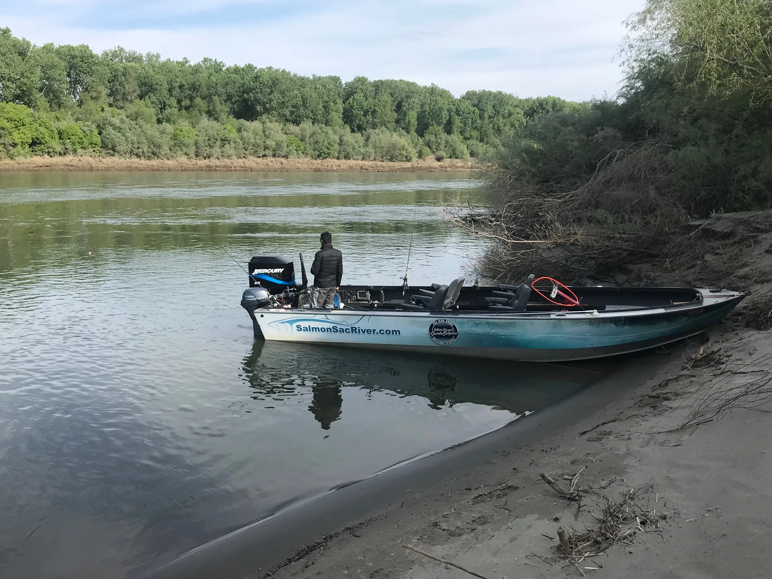 Fishing Guide Mike Rasmussen On The River Bank