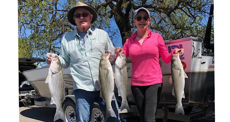 Husband and wife striper fishing Sacramento River