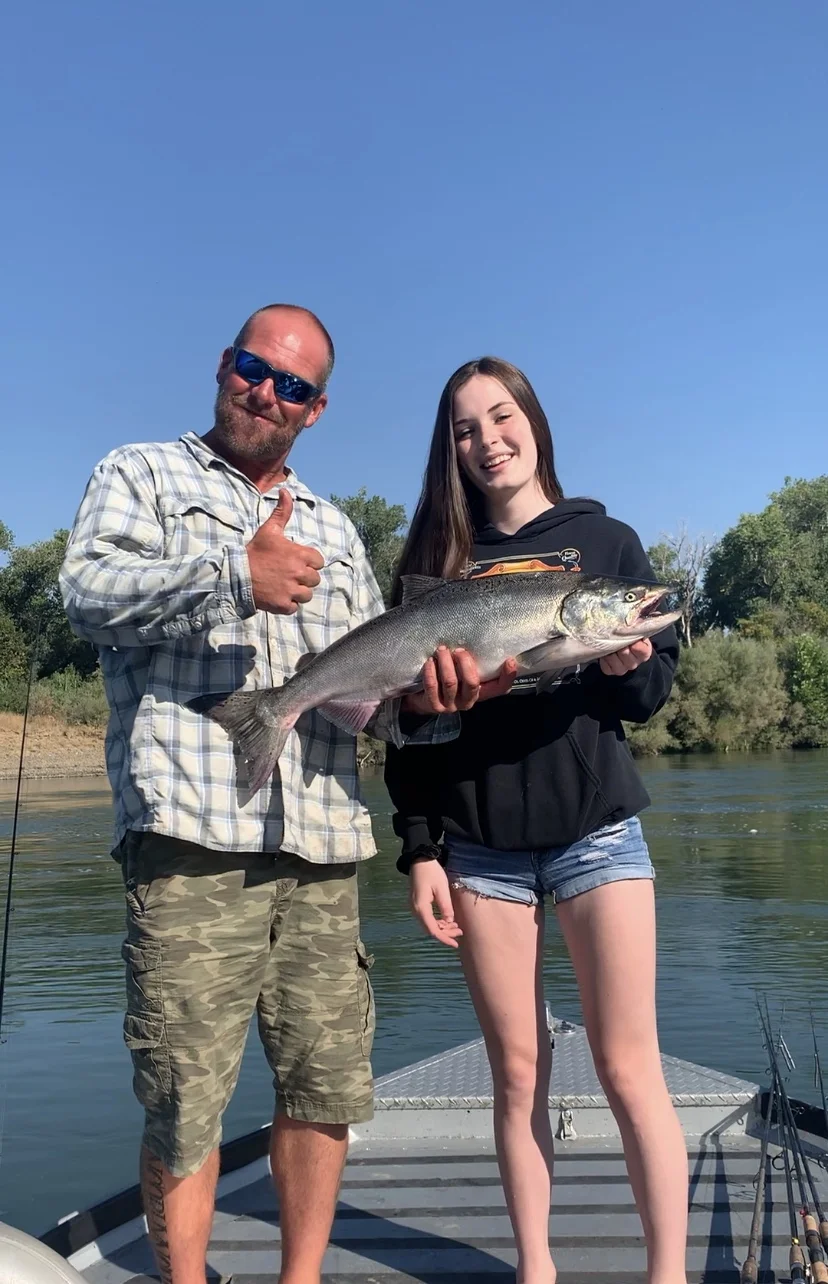 Father And Daughter Salmon Fishing