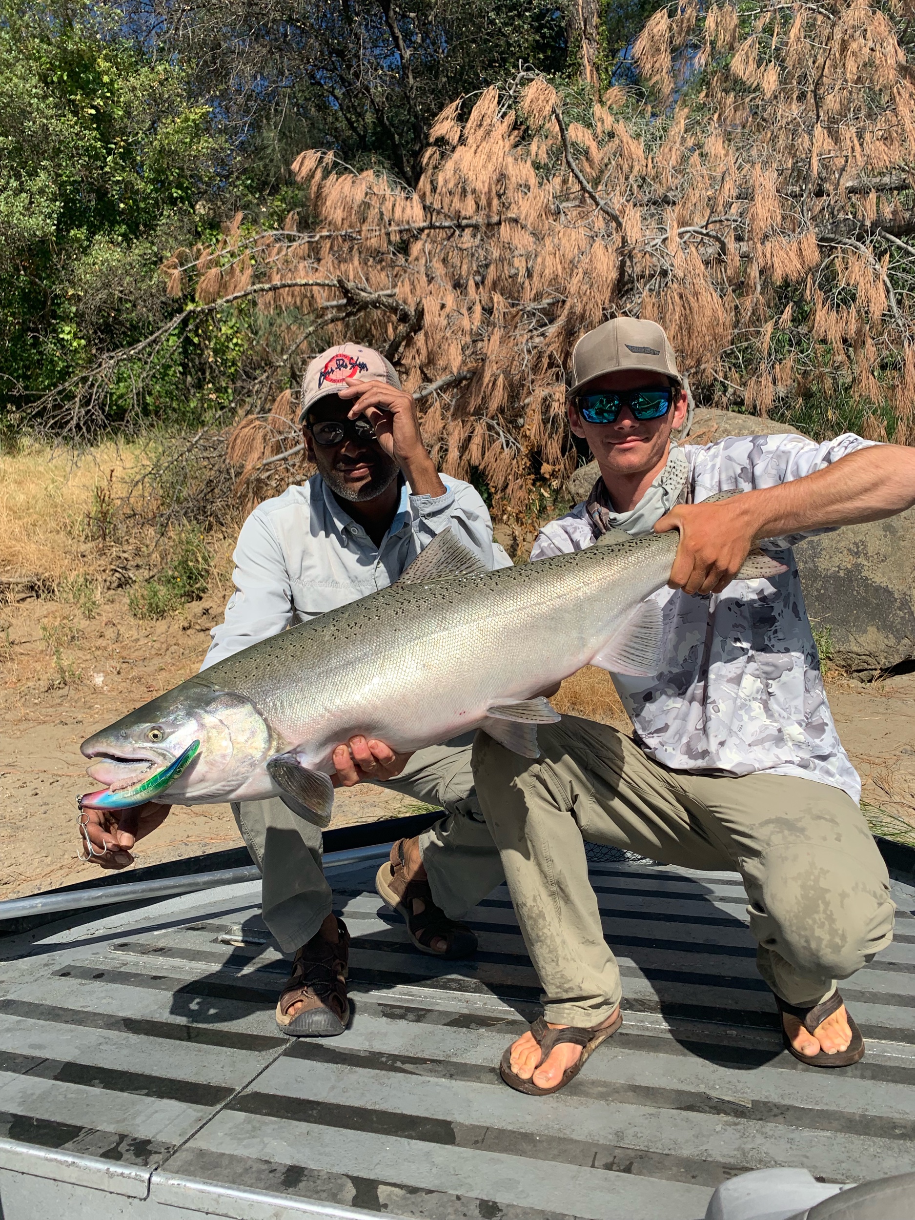 Fishing Guide Poses With Client On July, 6 2019