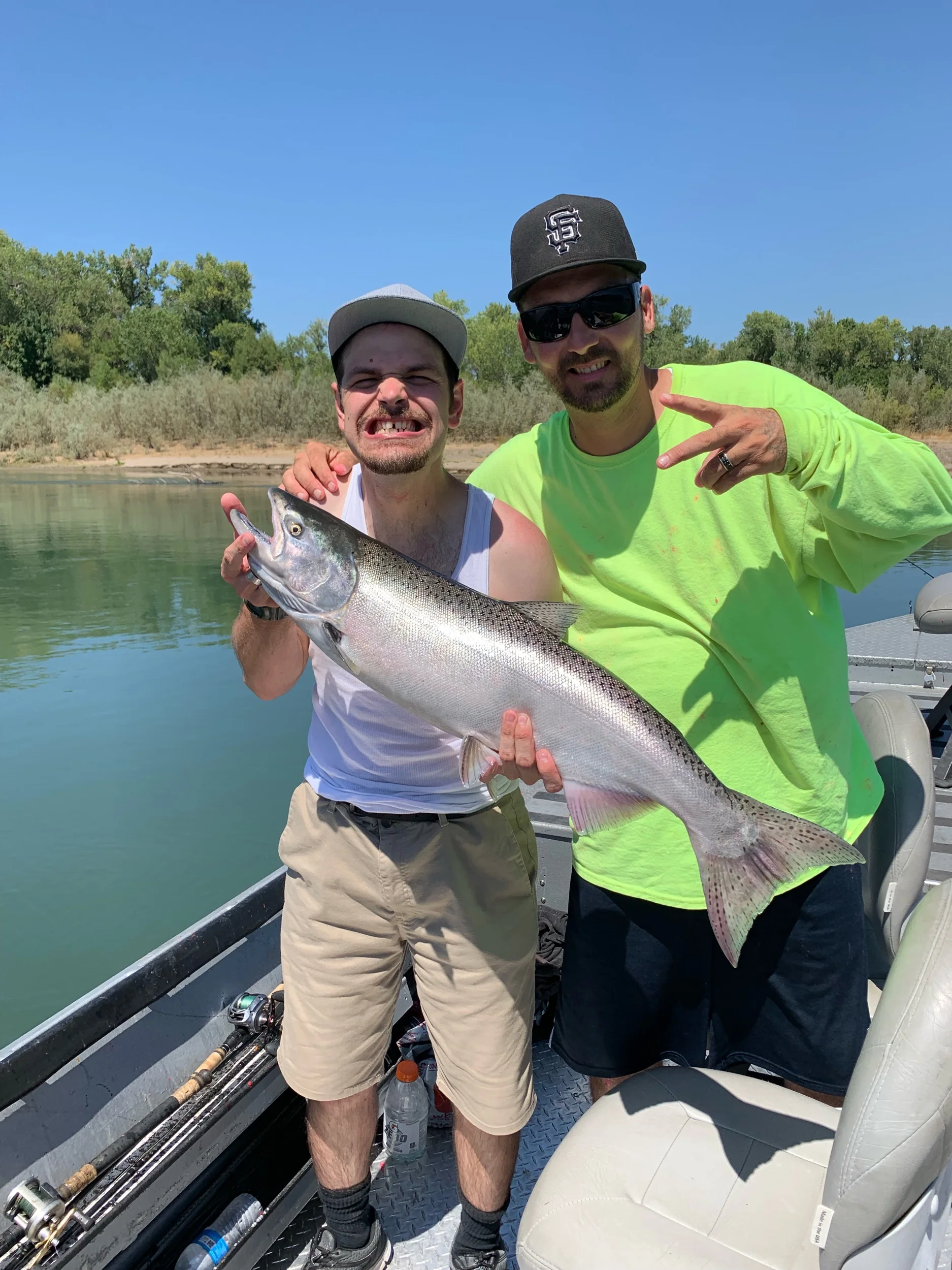 Brian Clark formerly from Paradise, Ca now residing in Gridley, Ca brought his nephew Mathew salmon fishing on the Sacramento River. Mathew holds up his first salmon of the 2019 salmon season. A truly special guest to have on board. Brian Clark stands with Mathew for the photograph.