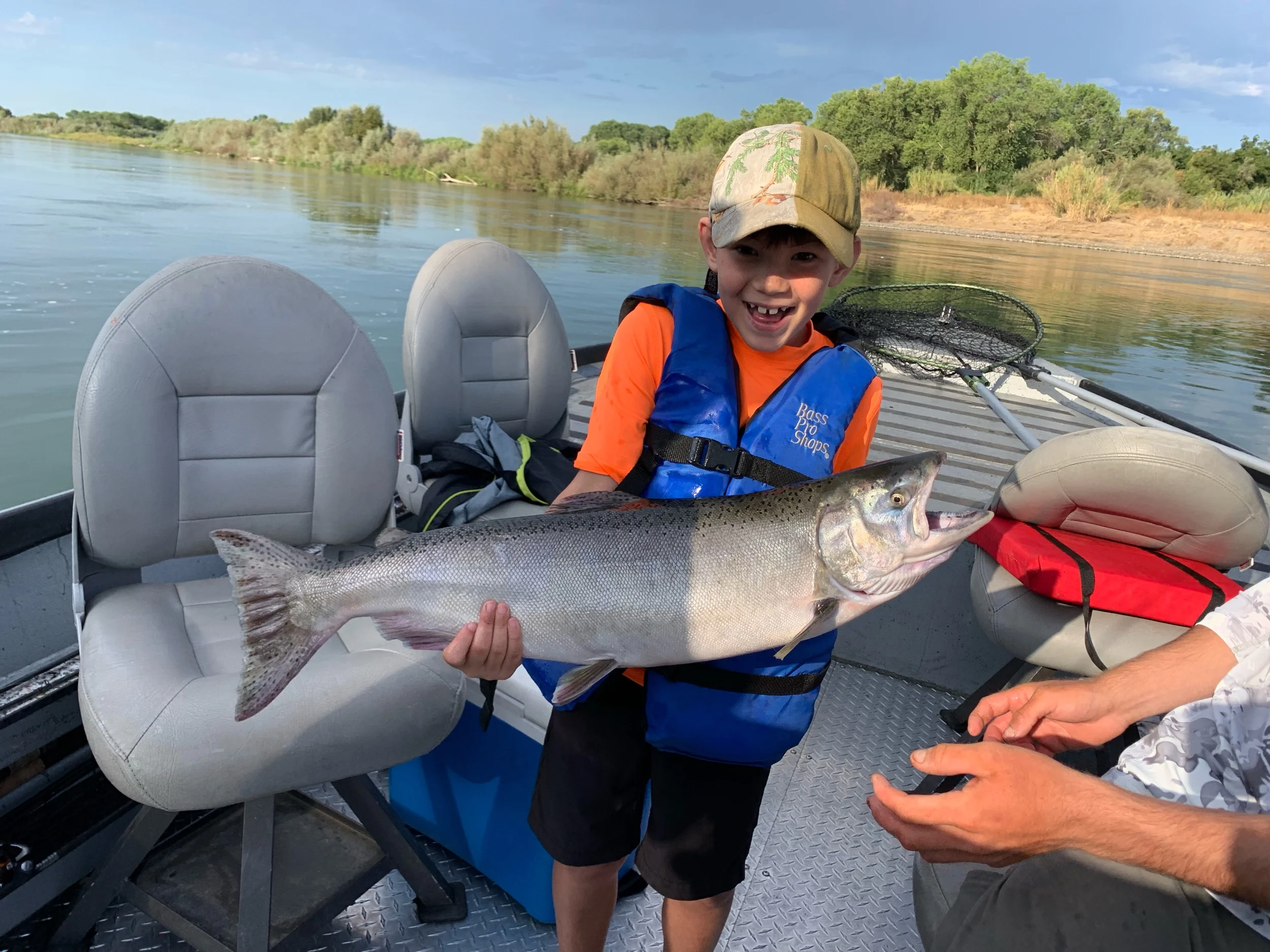 7 Year Old With His First Salmon