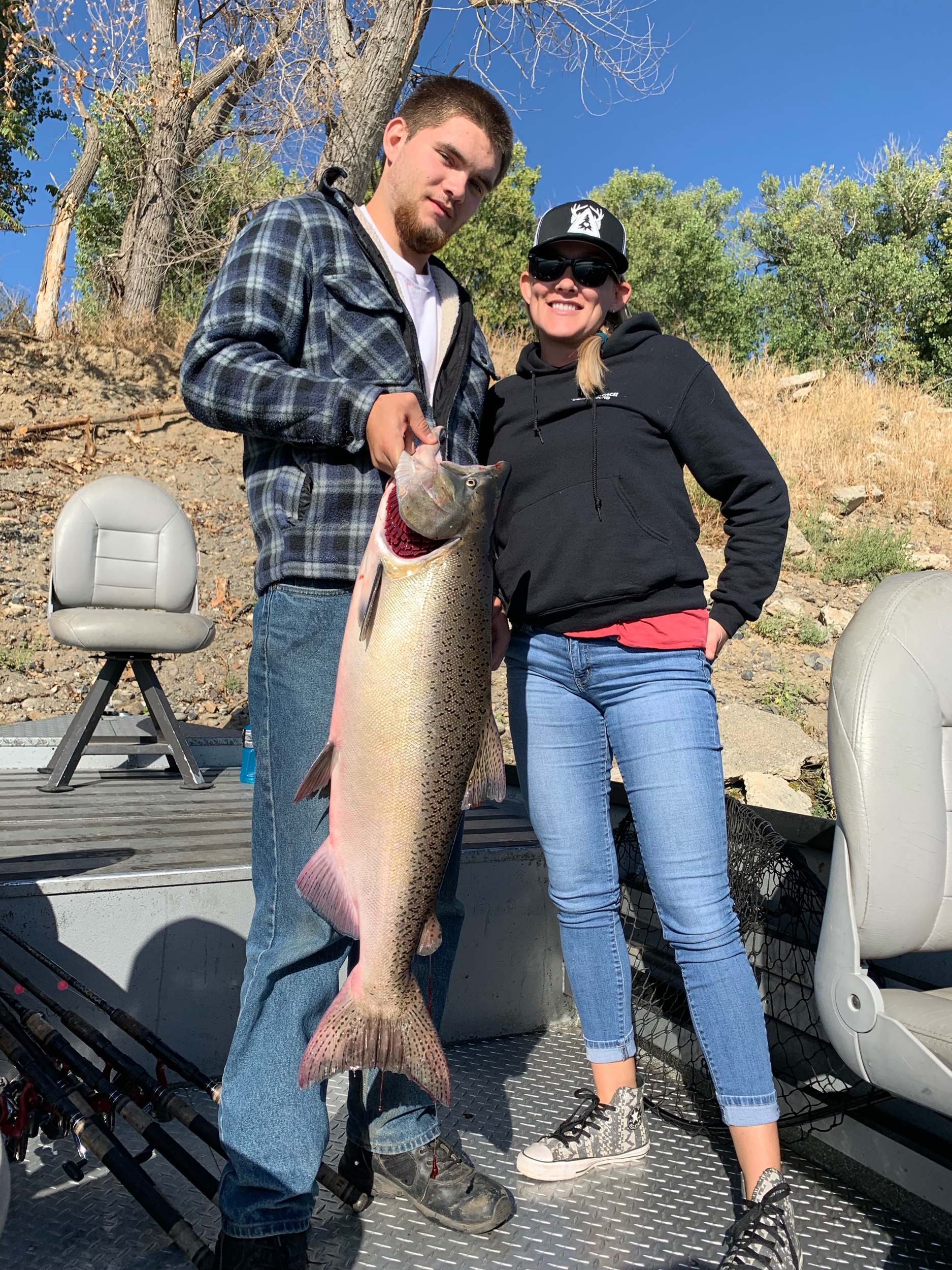 Mother And Son Hold Up A Beastly King Salmon