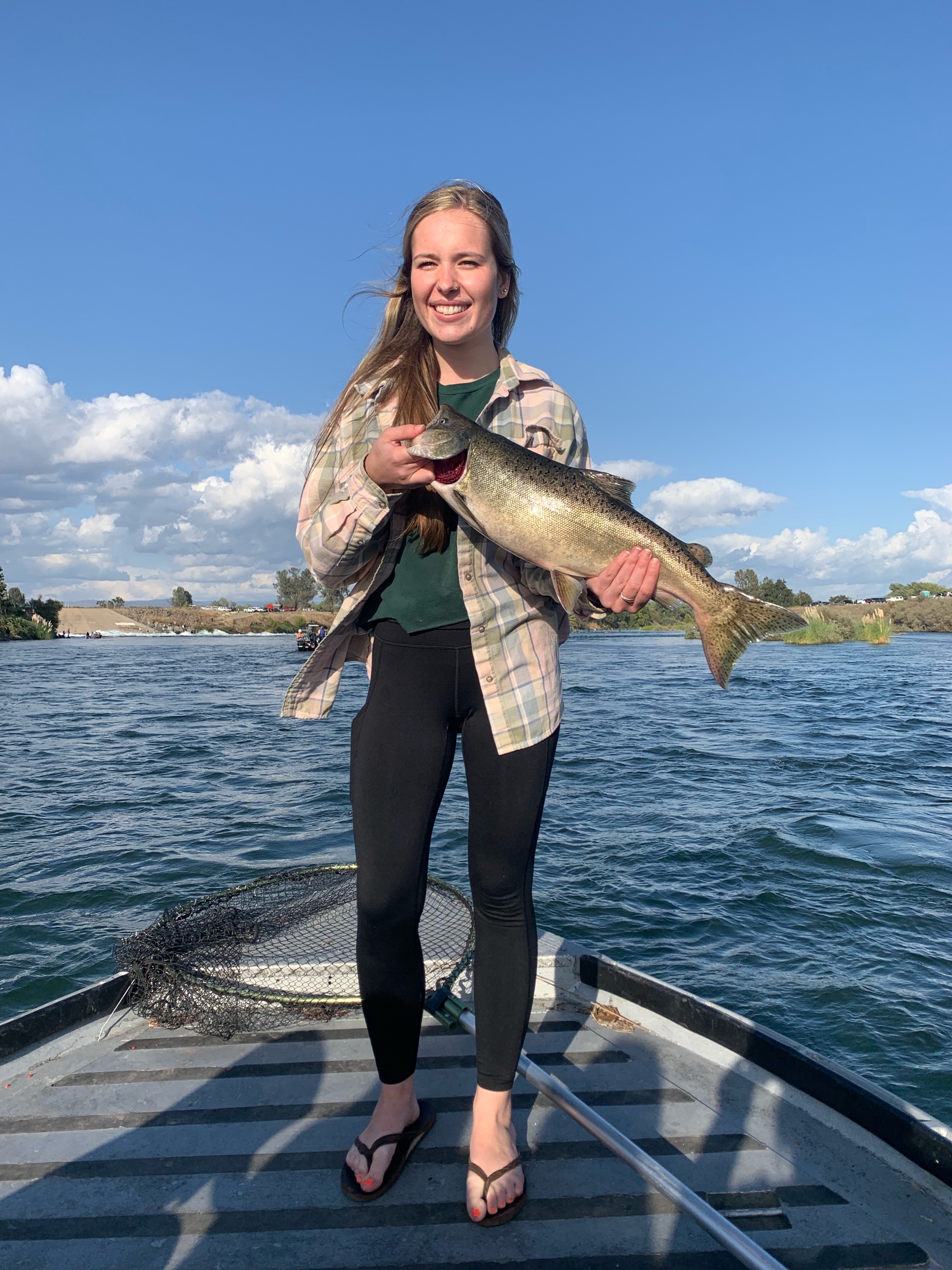 Katie Rasmussen Holds Up A Feather River King Salmon