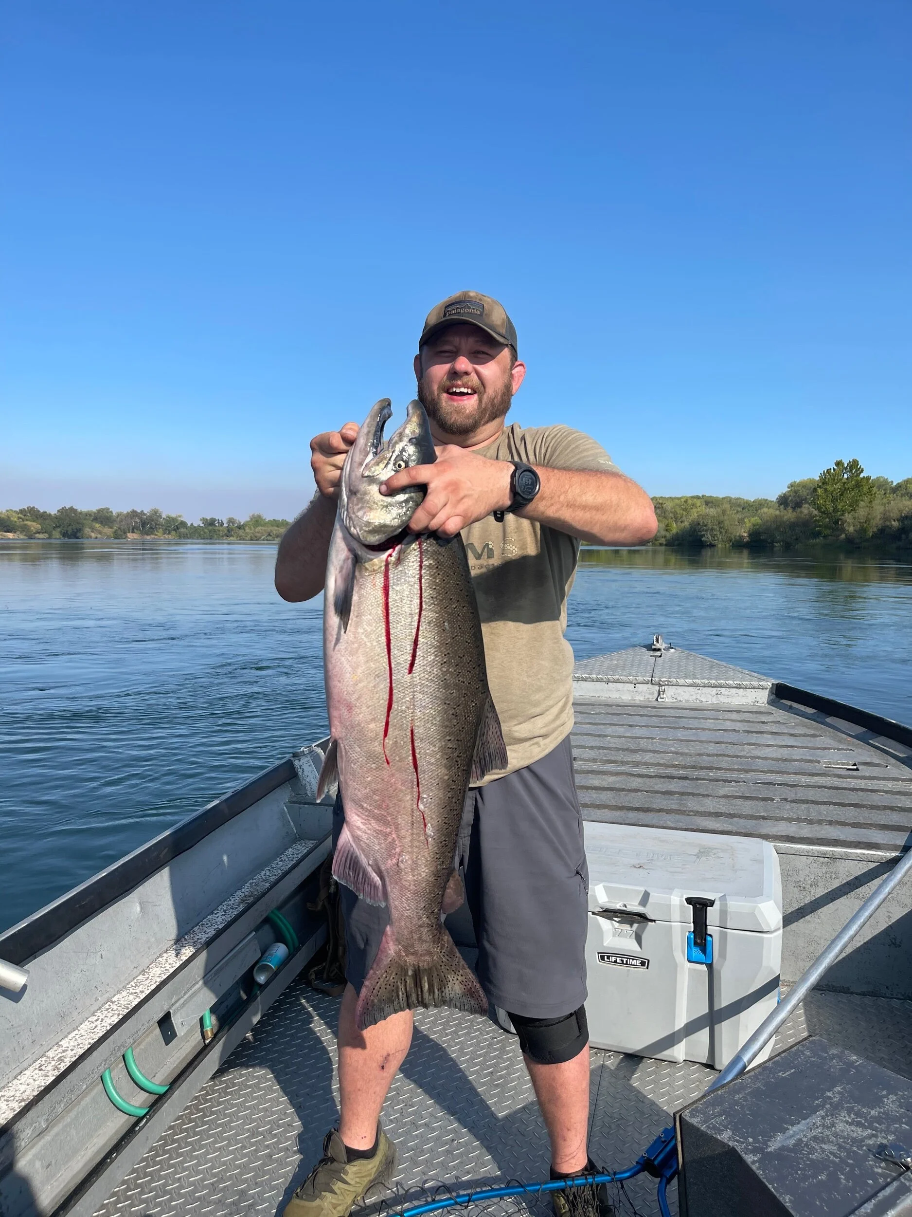 Shaun is all smiles after catching this king salmon, on a afternoon fishing trip at Woodson Bridge in Corning, Ca on August 24, 2021