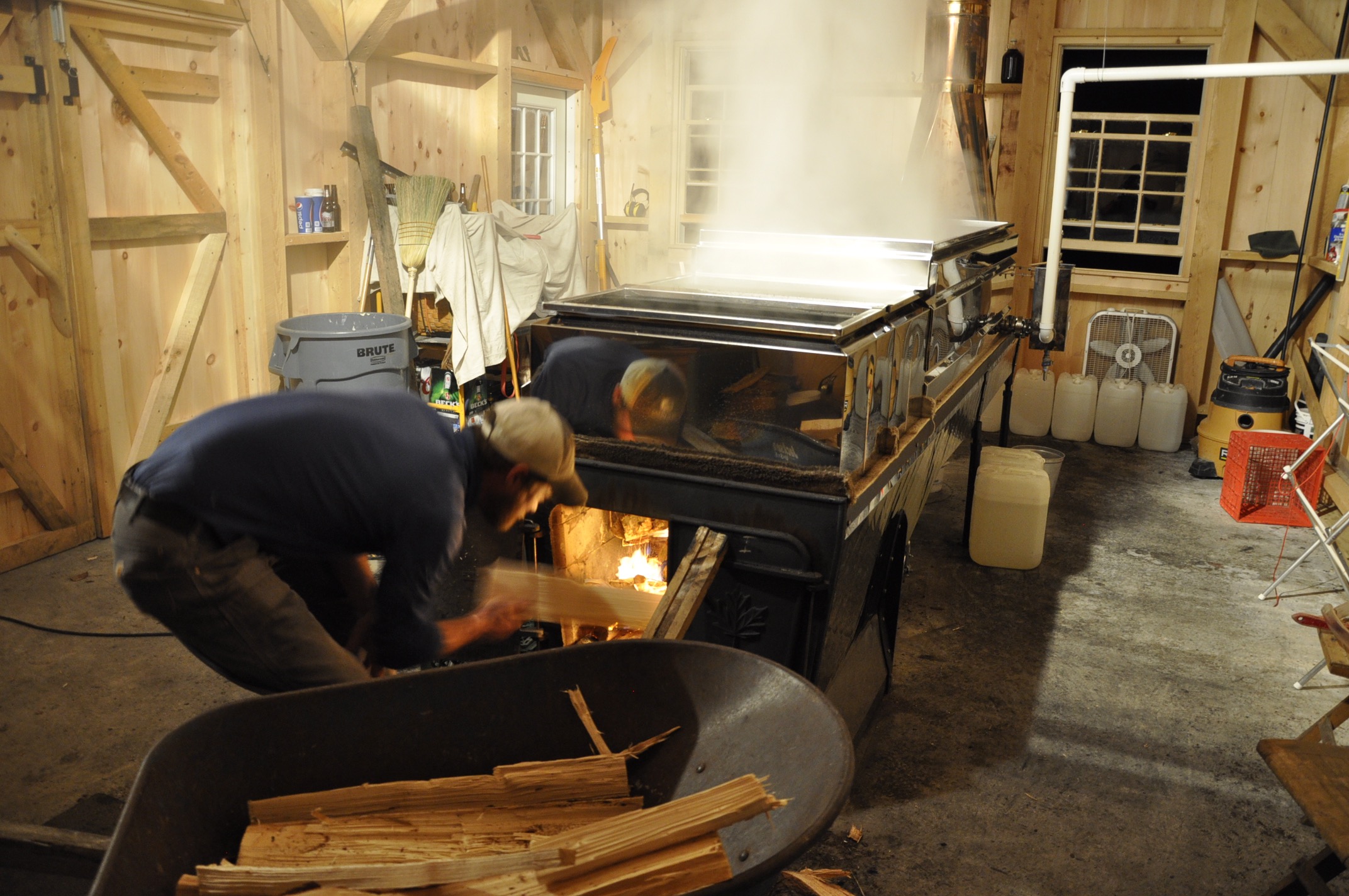 The arch gets fired with a barrow's load of wood about every five minutes. Gasses escaping through the flue are above 1000 degrees F.