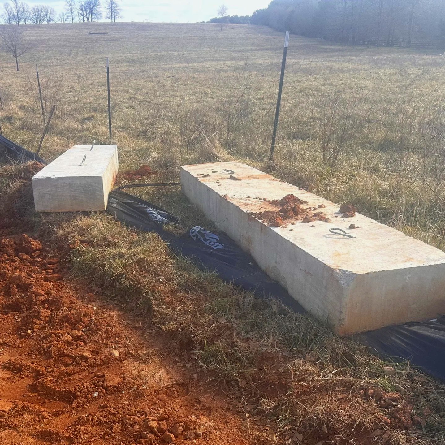 Supplies placed on silt Fence