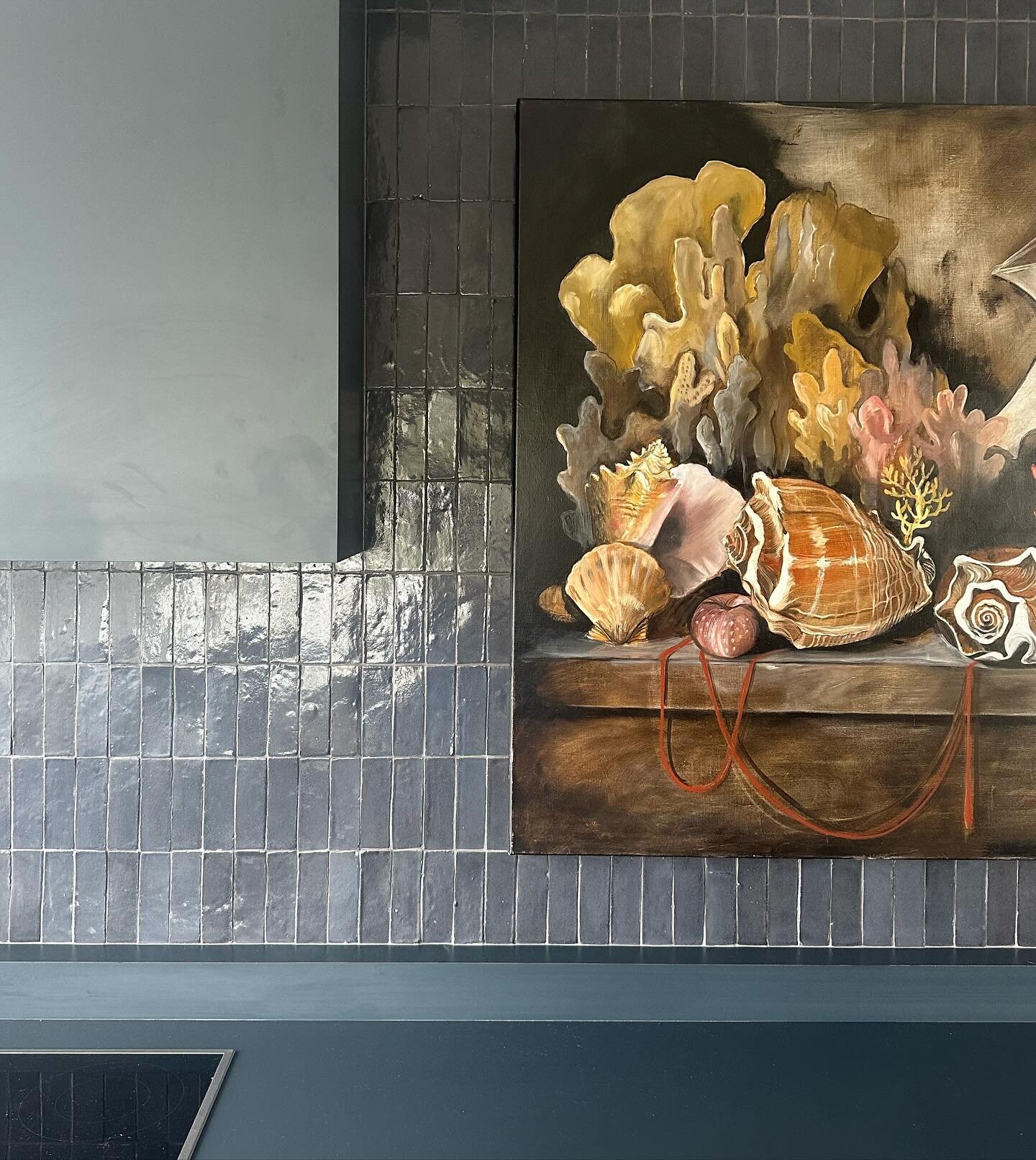 The most beautiful kitchen using our navy zellige tiles and matched with a stunning painting by the very talented @dianawatson70 #interiordesign #artist #tiles #zellige