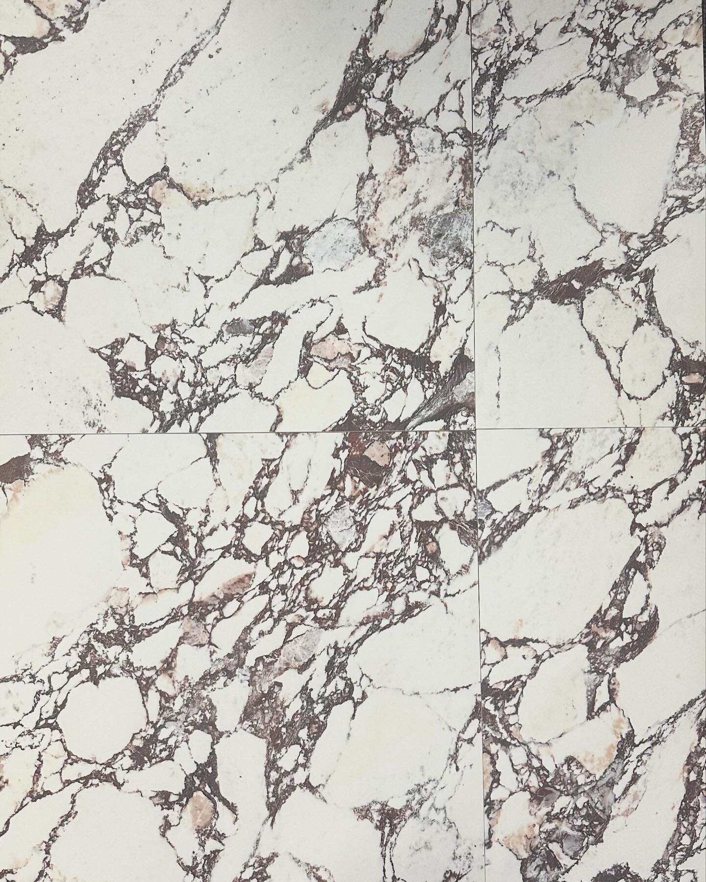 Stone or porcelain? These incredible new porcelain tiles where you can feel the veins are quite epic! We put natural viola up against it and you could not tell the difference! Sadly most of the green stone has been quarried out of the earth so porcel