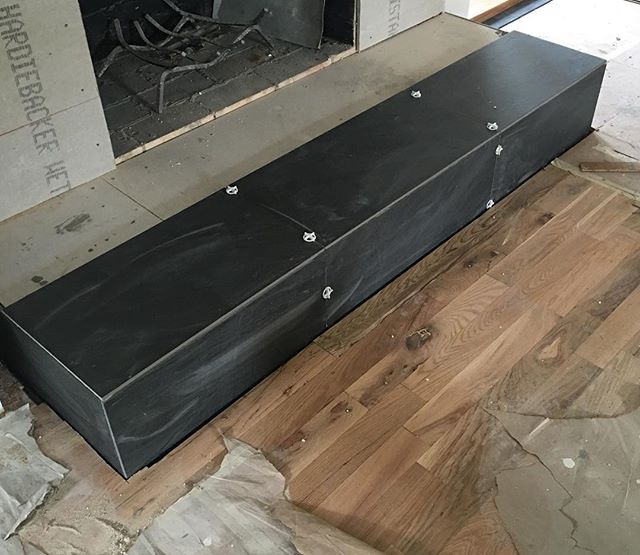 Loving this color combo for our latest project! The dark tile brings out the dark knots in the hardwoods. #tile #hardwoods #remodel #modernfarmhouse #dallasrealestate