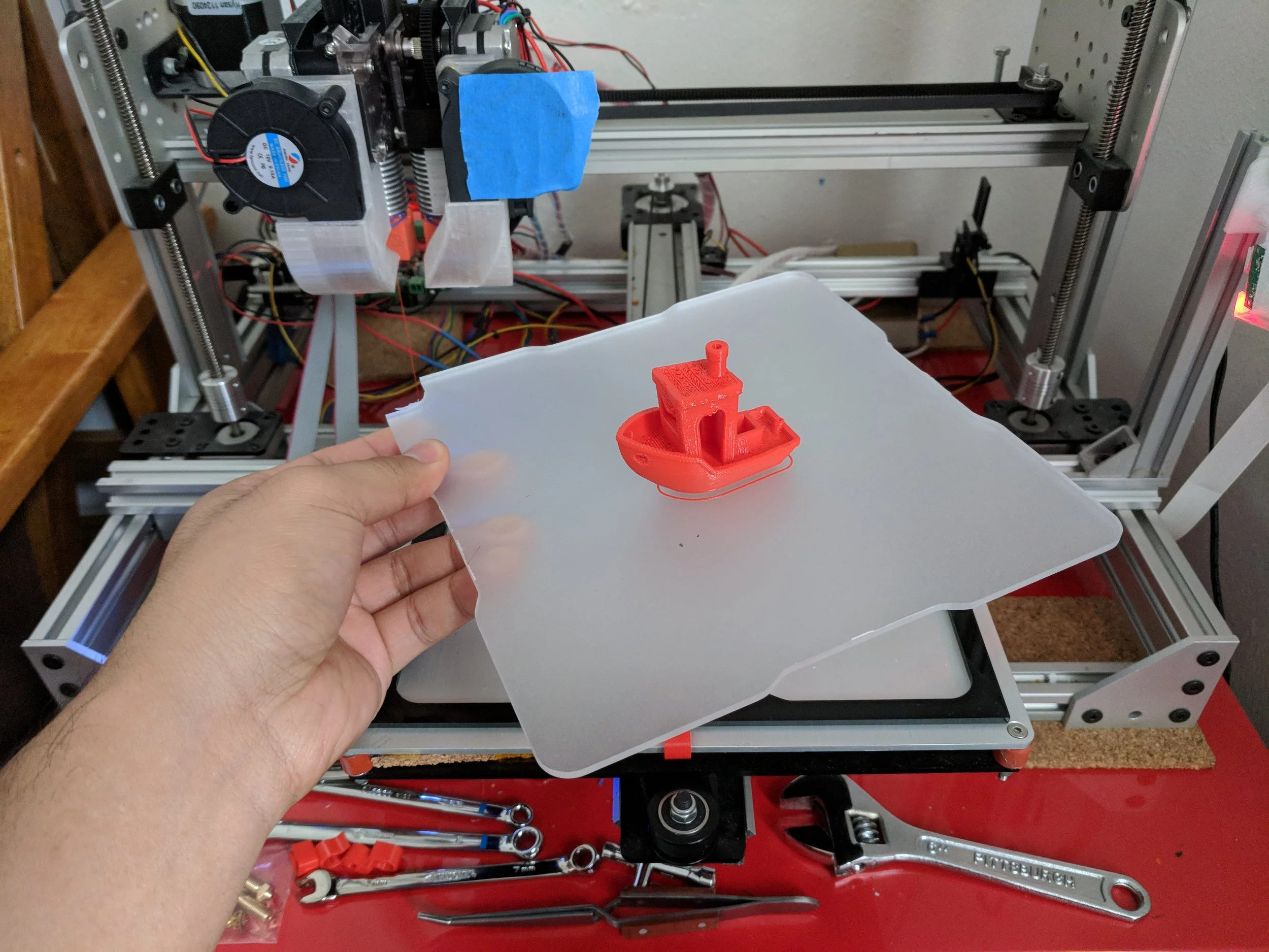 The plate is easy to remove by hand.
