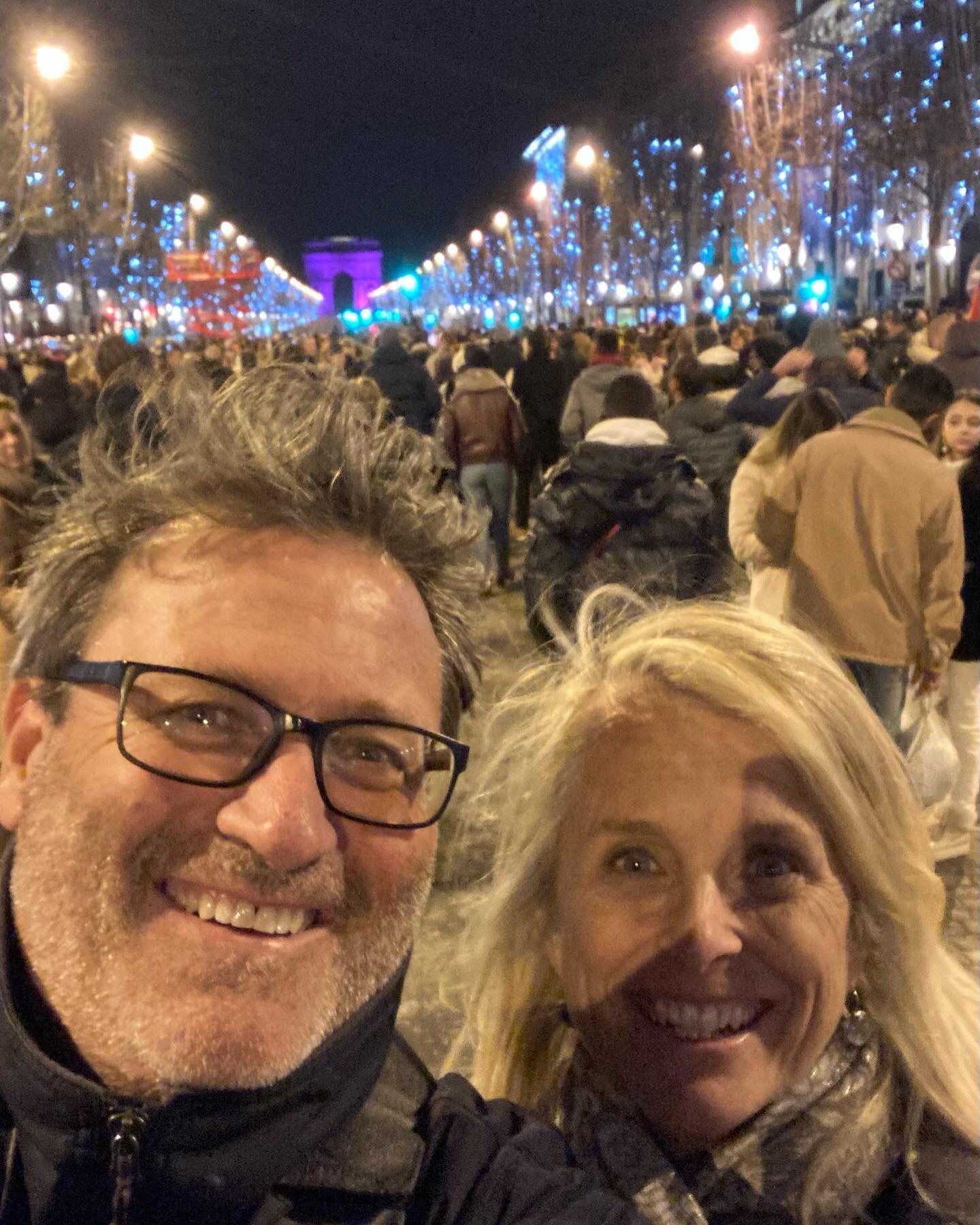 Happy New Year from a sea of 1 million people on the Champs &Eacute;lys&eacute;es! Living the dream with @fiona.kilponen &lsquo;Ooh la la&hellip;magnifique! 😂🇫🇷🥂
.
.
. 
.
. 
#paris #nye #champselysees #oohlala #magnifique