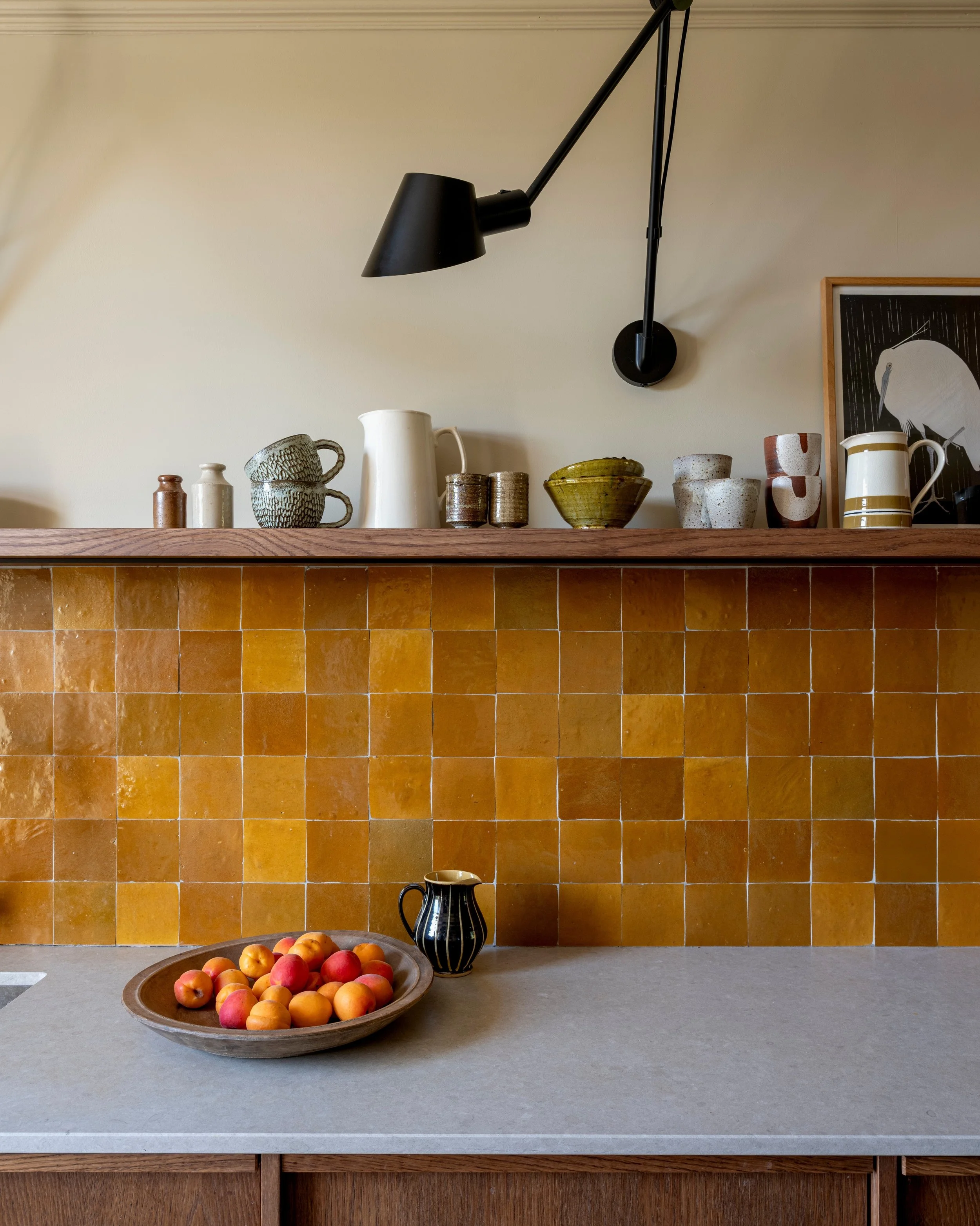 The scheme for the kitchen of our recently completed project in Bristol evolved as the space came together. 

The ochre yellow flowing through the rest of the house was repeated here in the zellige tiles and gave an joyful injection of colour to the 
