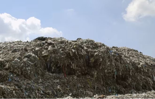 Image of Textile Waste taken from film still of The True Cost 