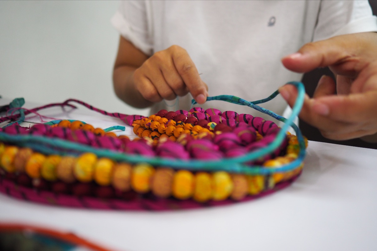 Image of Artisan and sari necklace.jpg