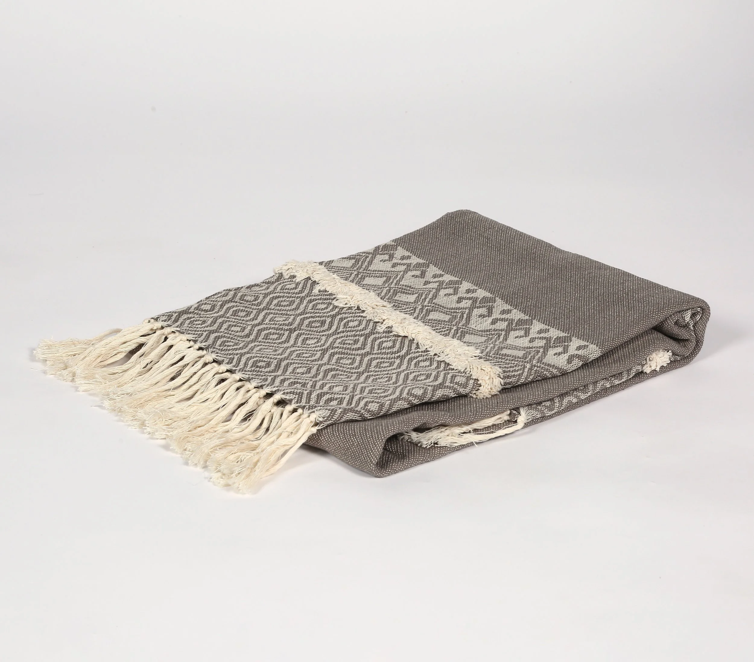 Handwoven Muted Coffee tasseled throw.JPG