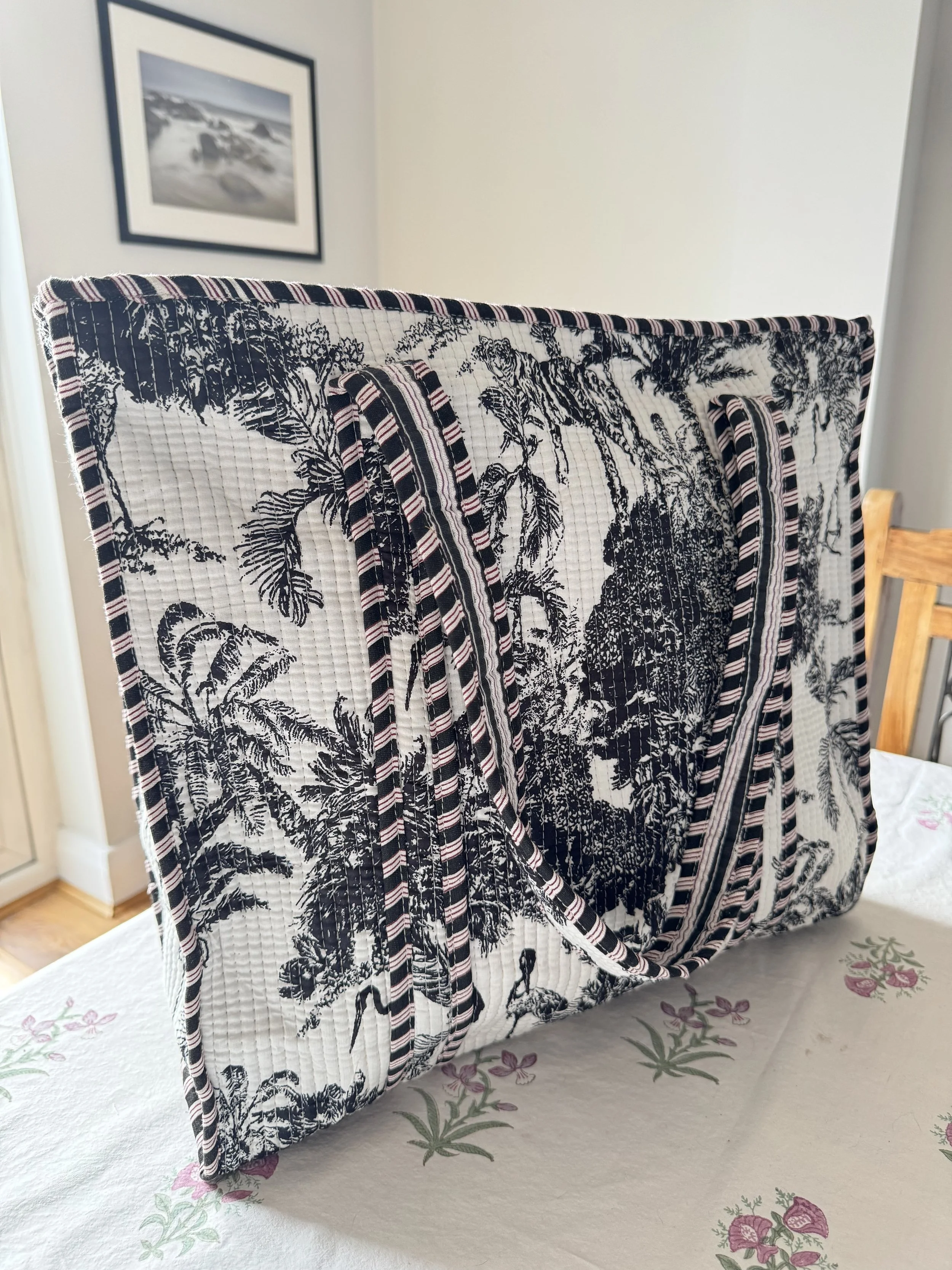 Handmade jungle Toile screen printed quilted cotton tote bag in black and white doile de jouy print with contrasting diagonal striped trims by Jewelled Buddha