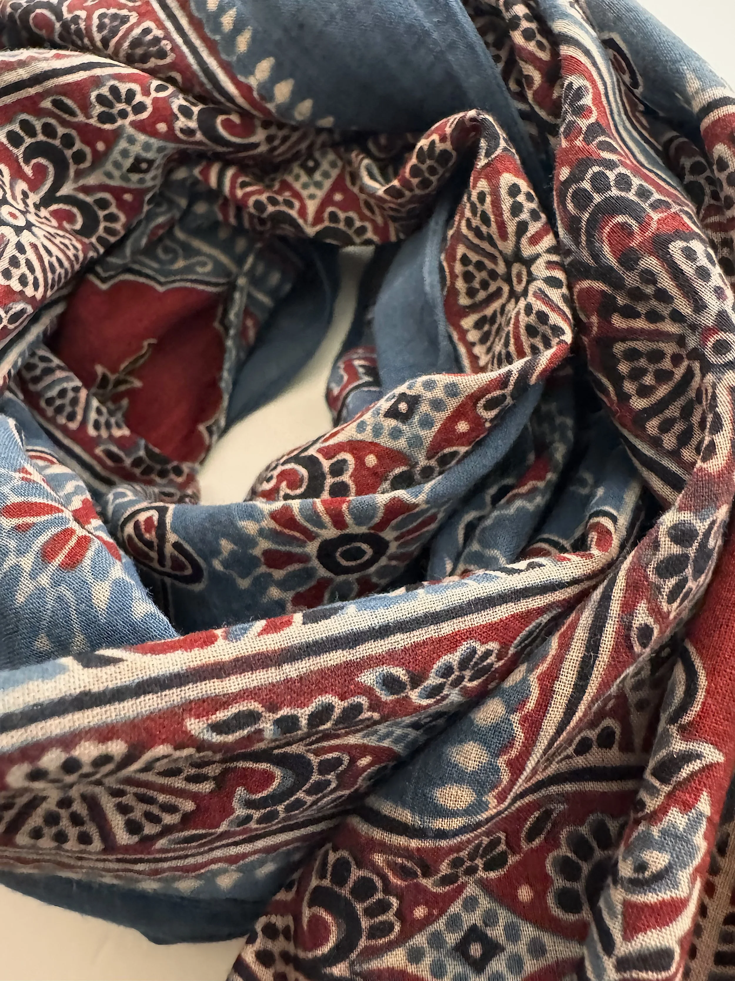 Red leaf motif on an Ajrakh cotton scarf, hand block printed with natural dyes