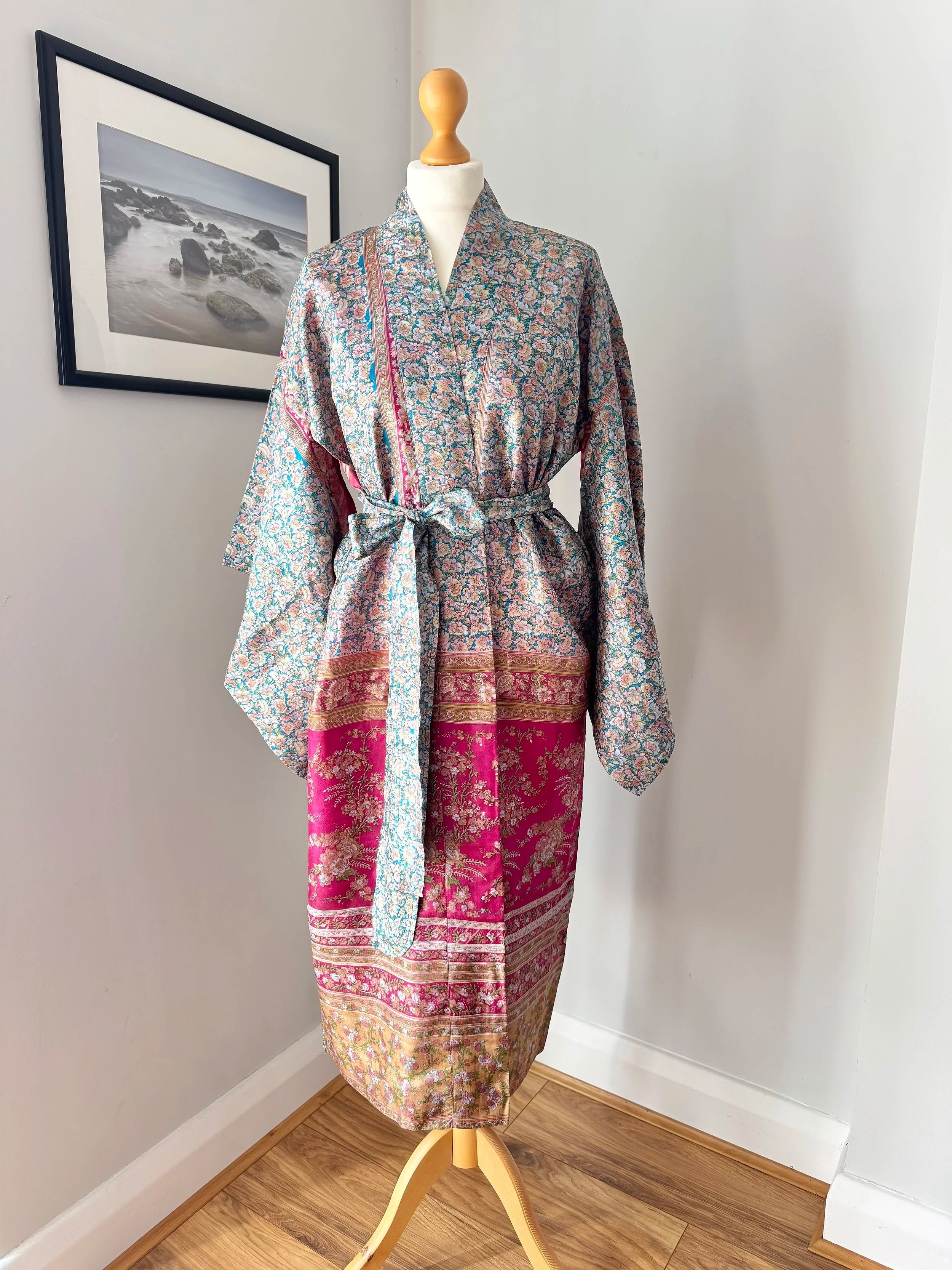 Recycled sari silk kimono dressing gown with floral print and striking border styled on a mannequin