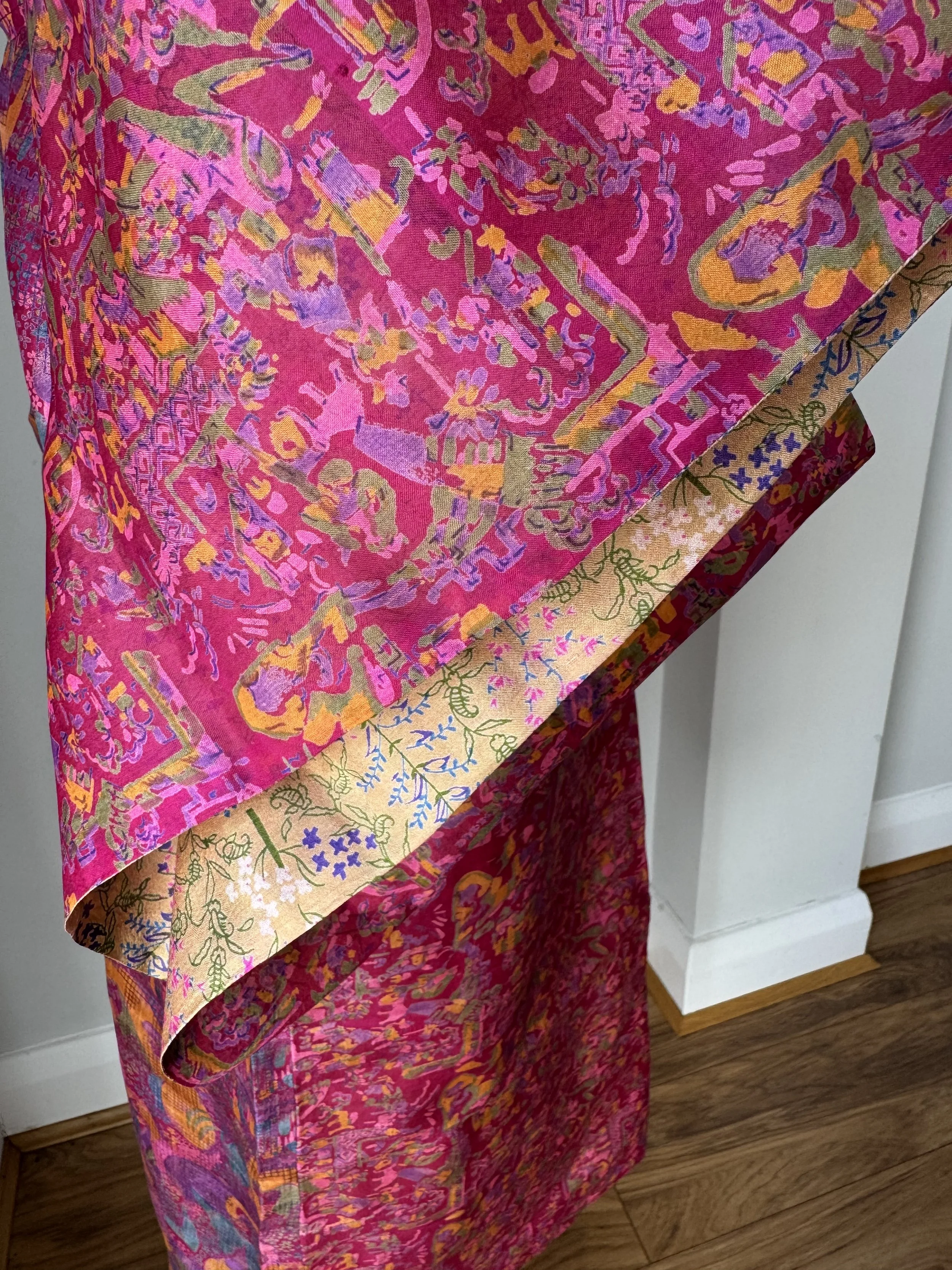 Pink silk floral kimono sleeve showing golden beige silk lining