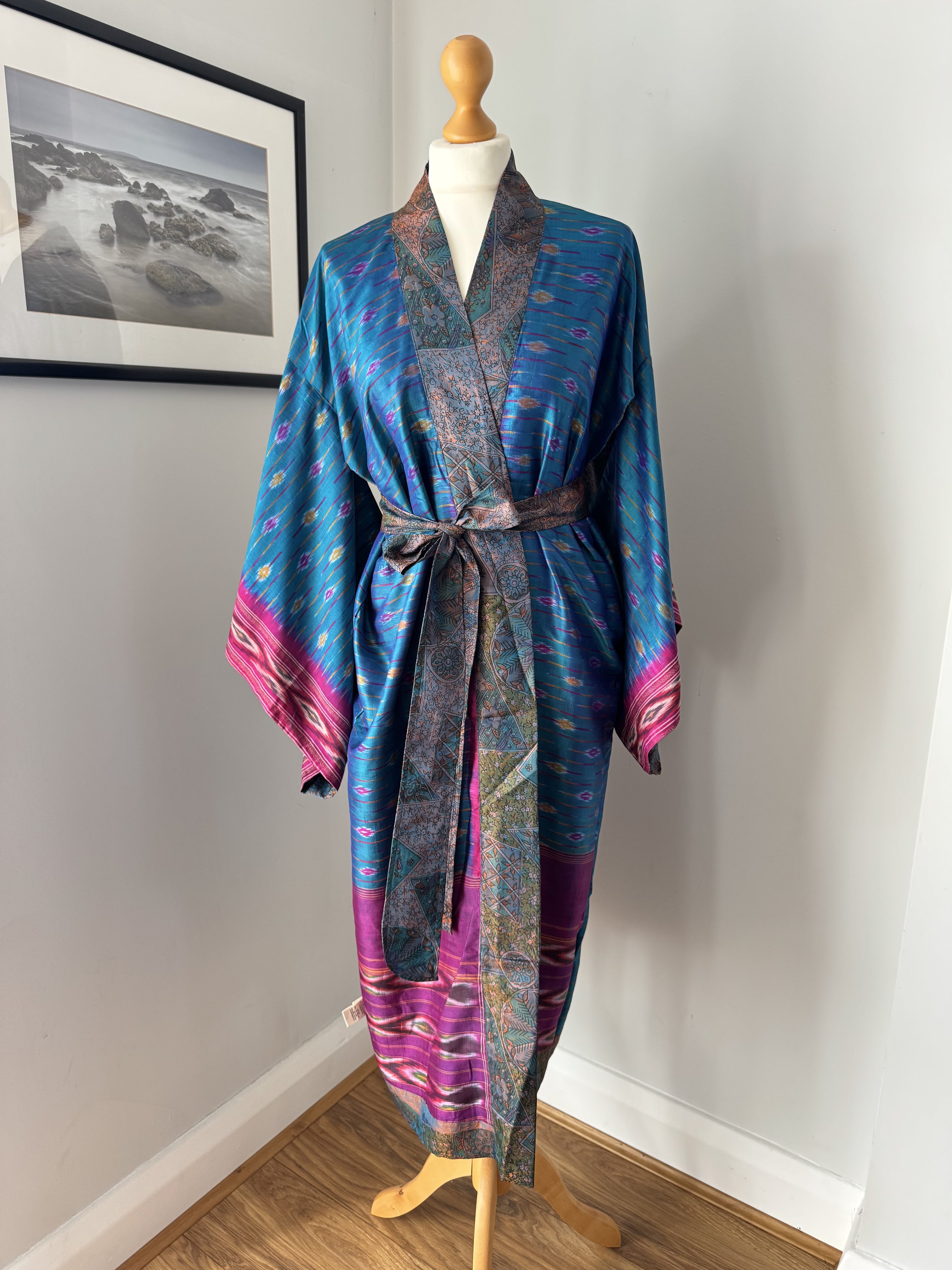 Peacock blue silk kimono robe with contrasting pink kimono sleeve border and aztec pattern