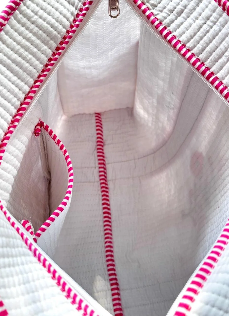Close up of an inside pocket of a handmade quilted cotton tote bag.