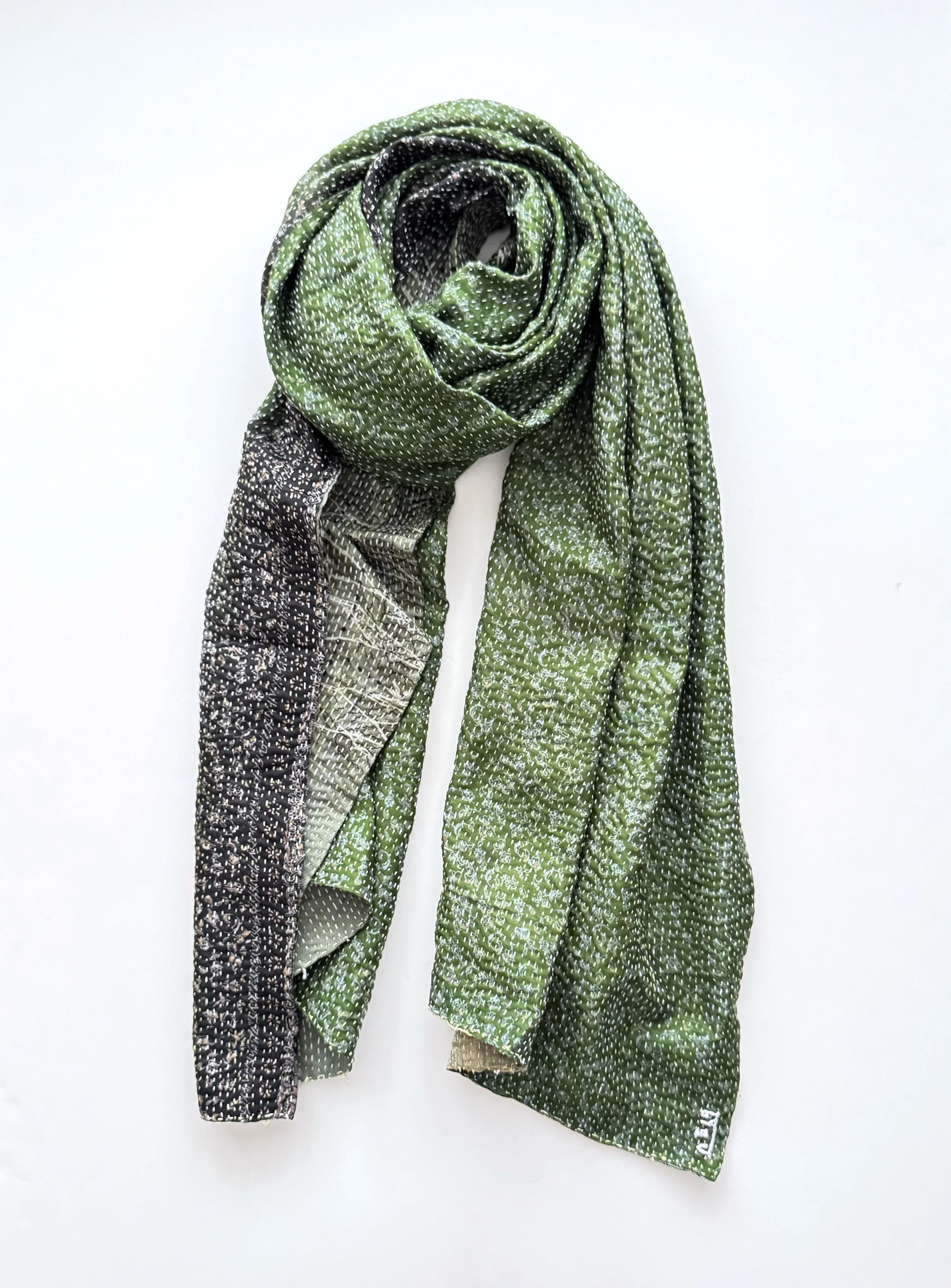 Colourful green and charcoal grey upcycled sari silk scarf hand embroidered with fine kantha stitch on a white background.