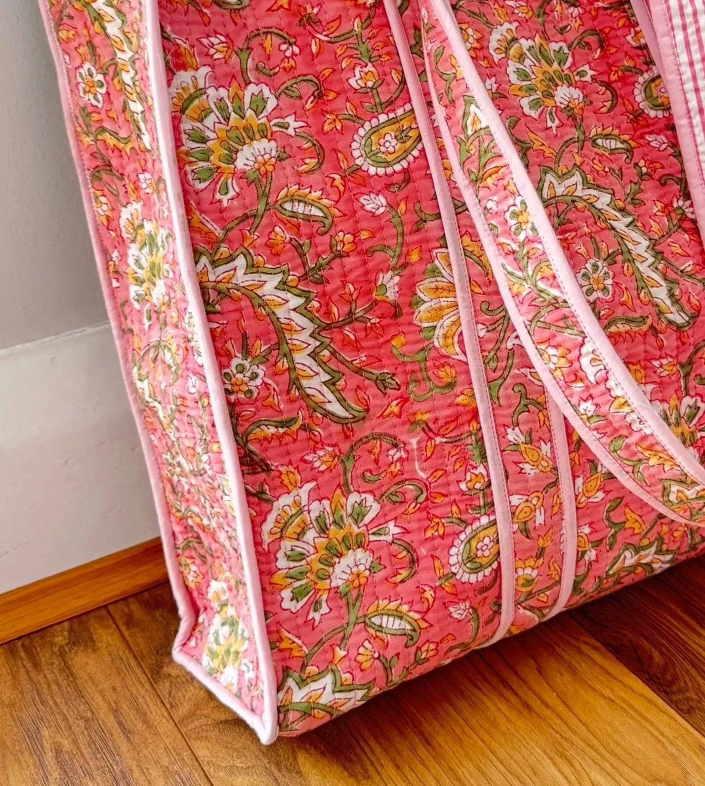 Close up of pretty floral block print pattern on shopping tote bag