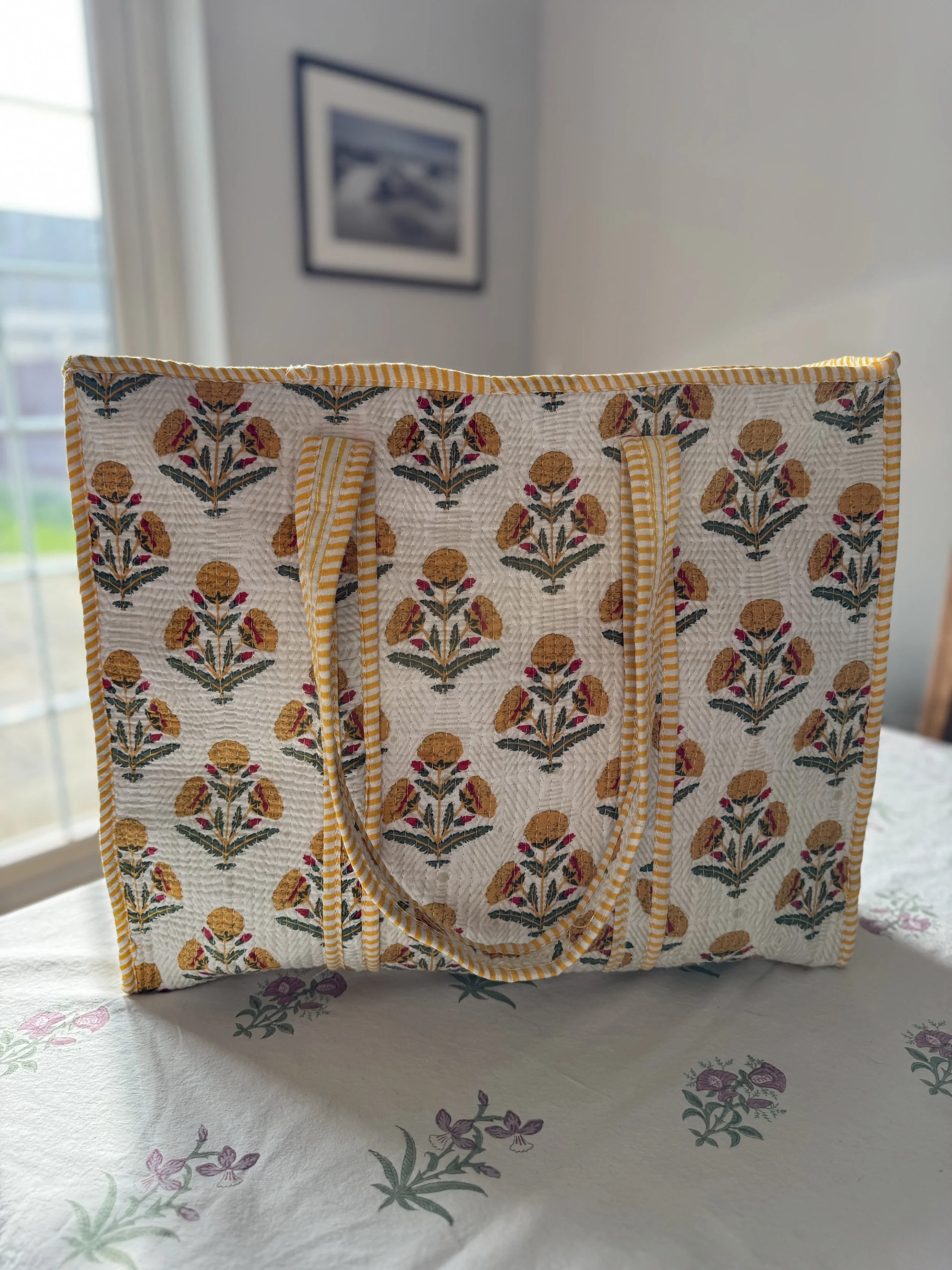 Jaipur flower quilted cotton tote bag in yellow and white with striped shoulder straps and contrasting striped trim
