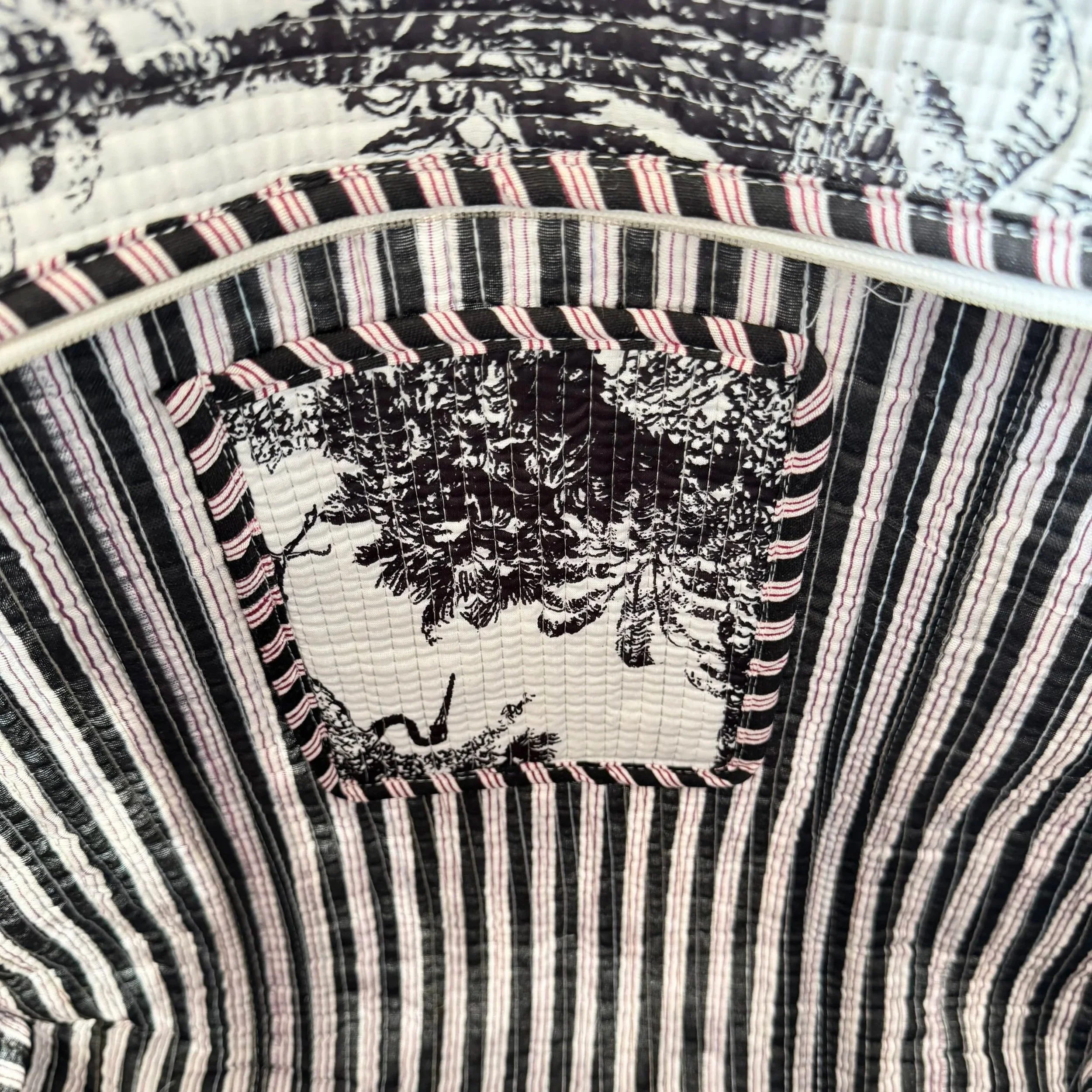 Inside pocket detail on inside handmade Jungle Toile quilted cotton tote bag, ideal for storing a everyday essentials
