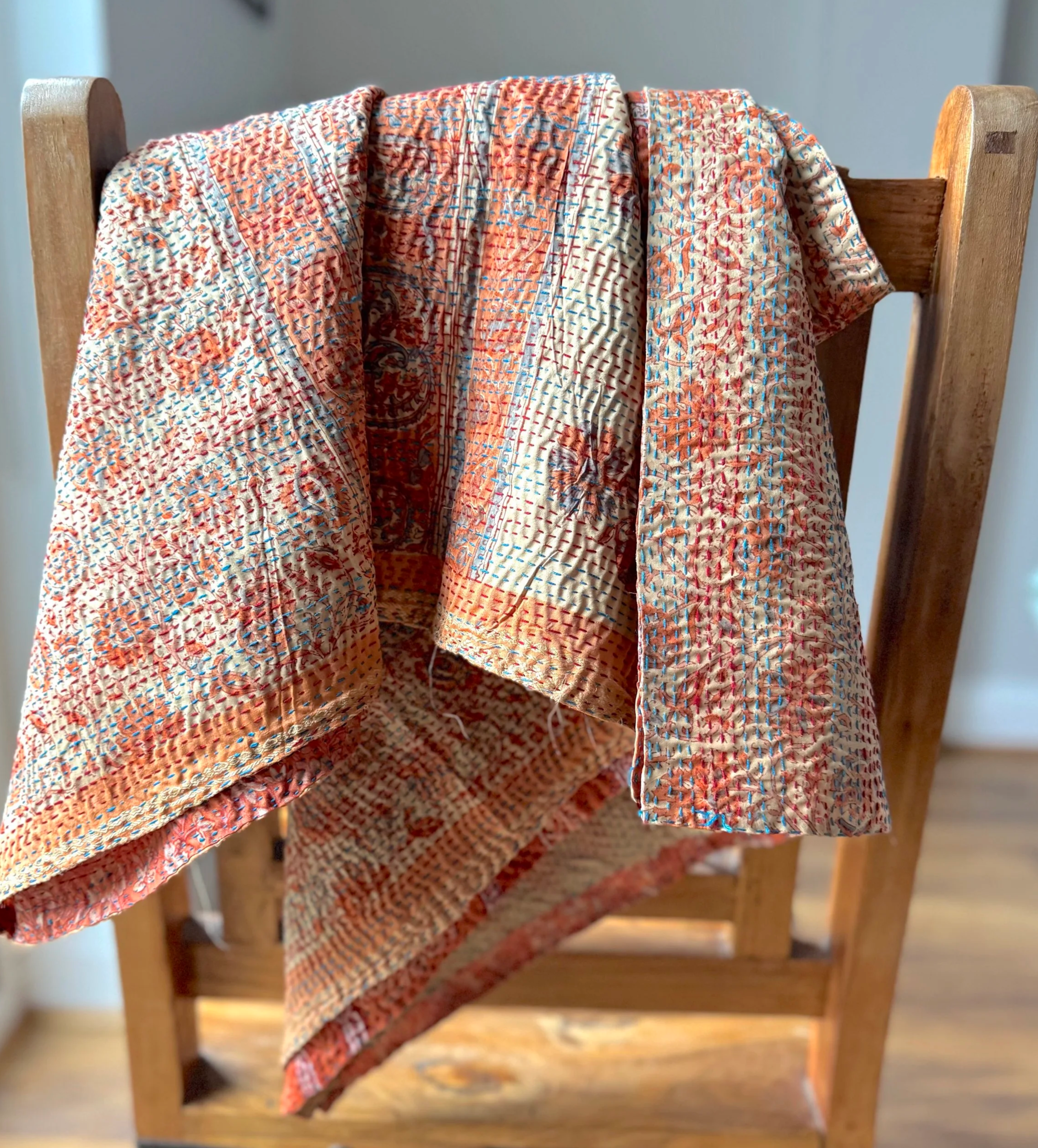 Floral quilted silk scarf crafted from recycled sari silk and upcycled with Kantha embroidery all over.