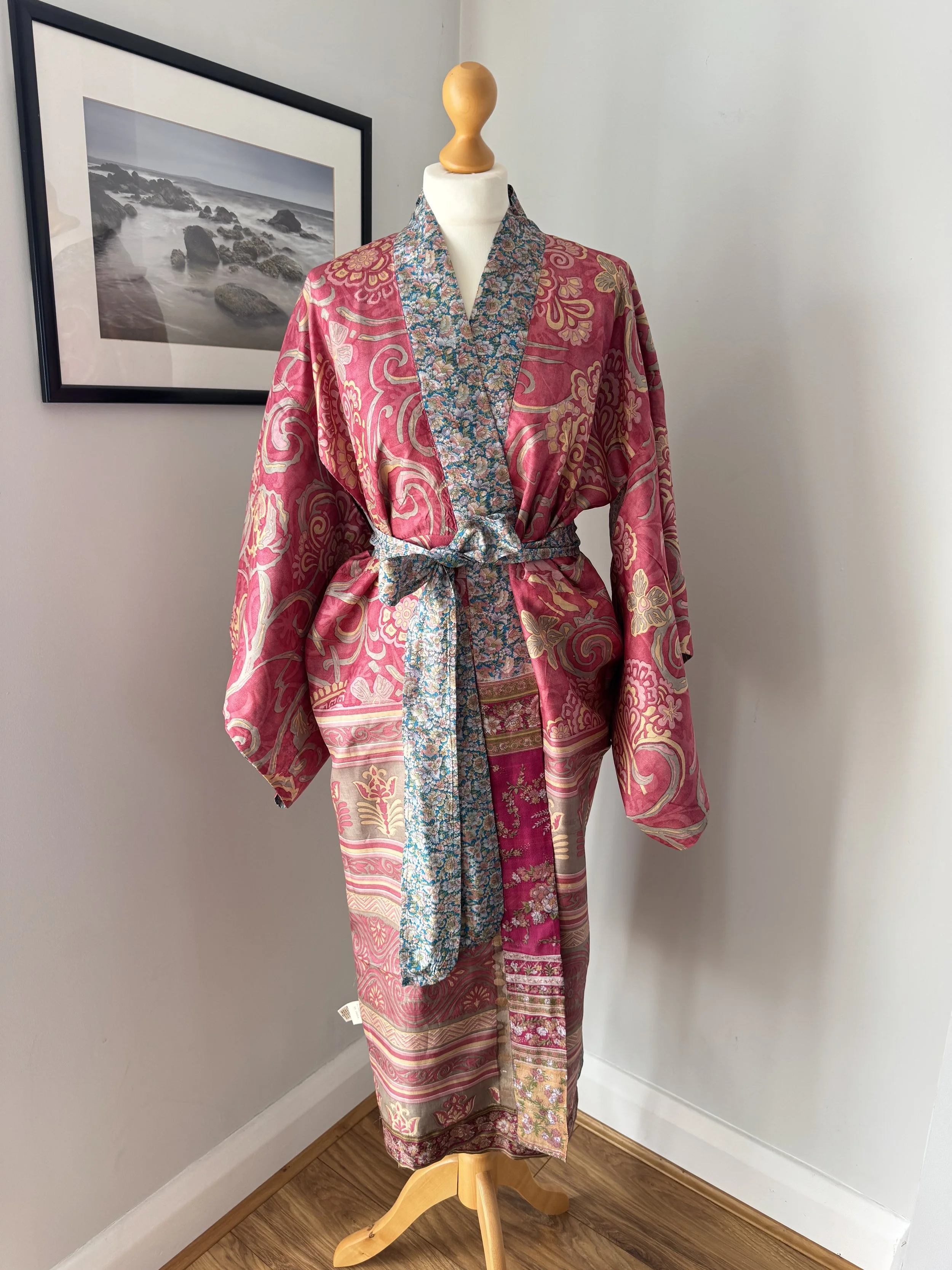 Upcycled sari silk kimono dressing gown lining in rose pink with a blue floral border and contrasting floral silk tie belt