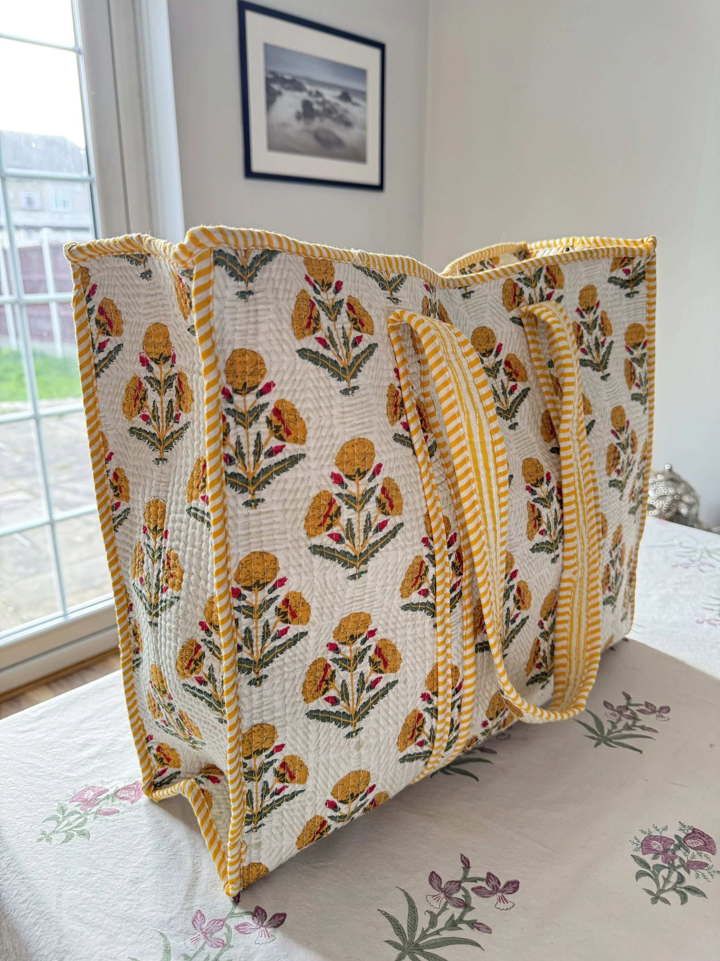 Colourful yellow Jaipur print cotton tote bag with contrasting striped shoulder straps and trims