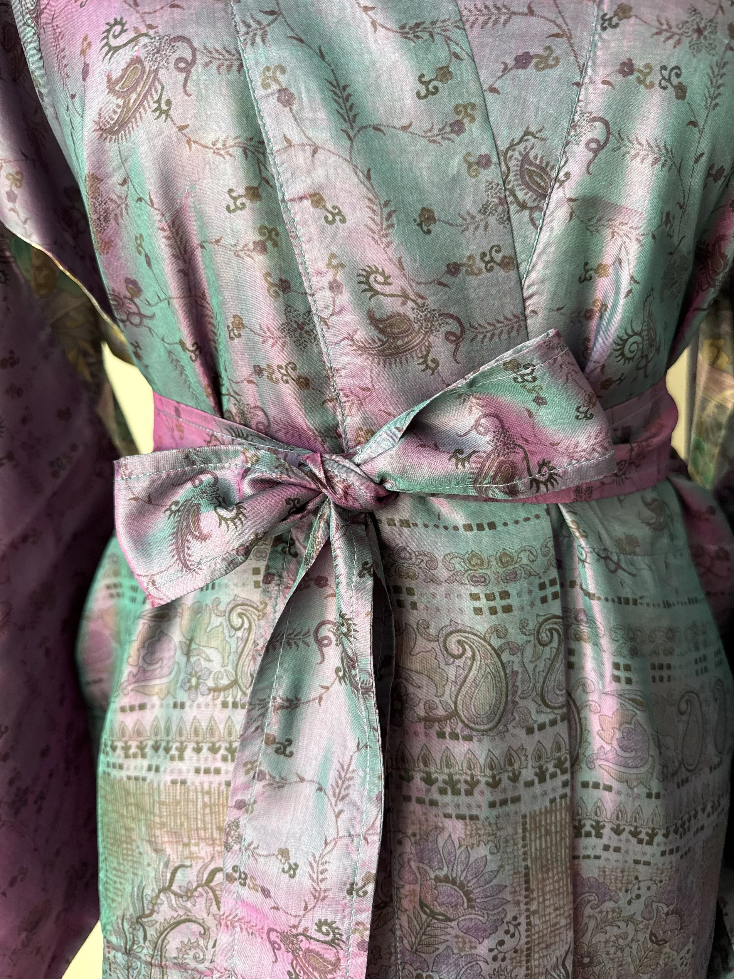 Two tone silk fabric on a long kimono robe with an irridescent effect, wrap-over front detail and matching silk tie belt