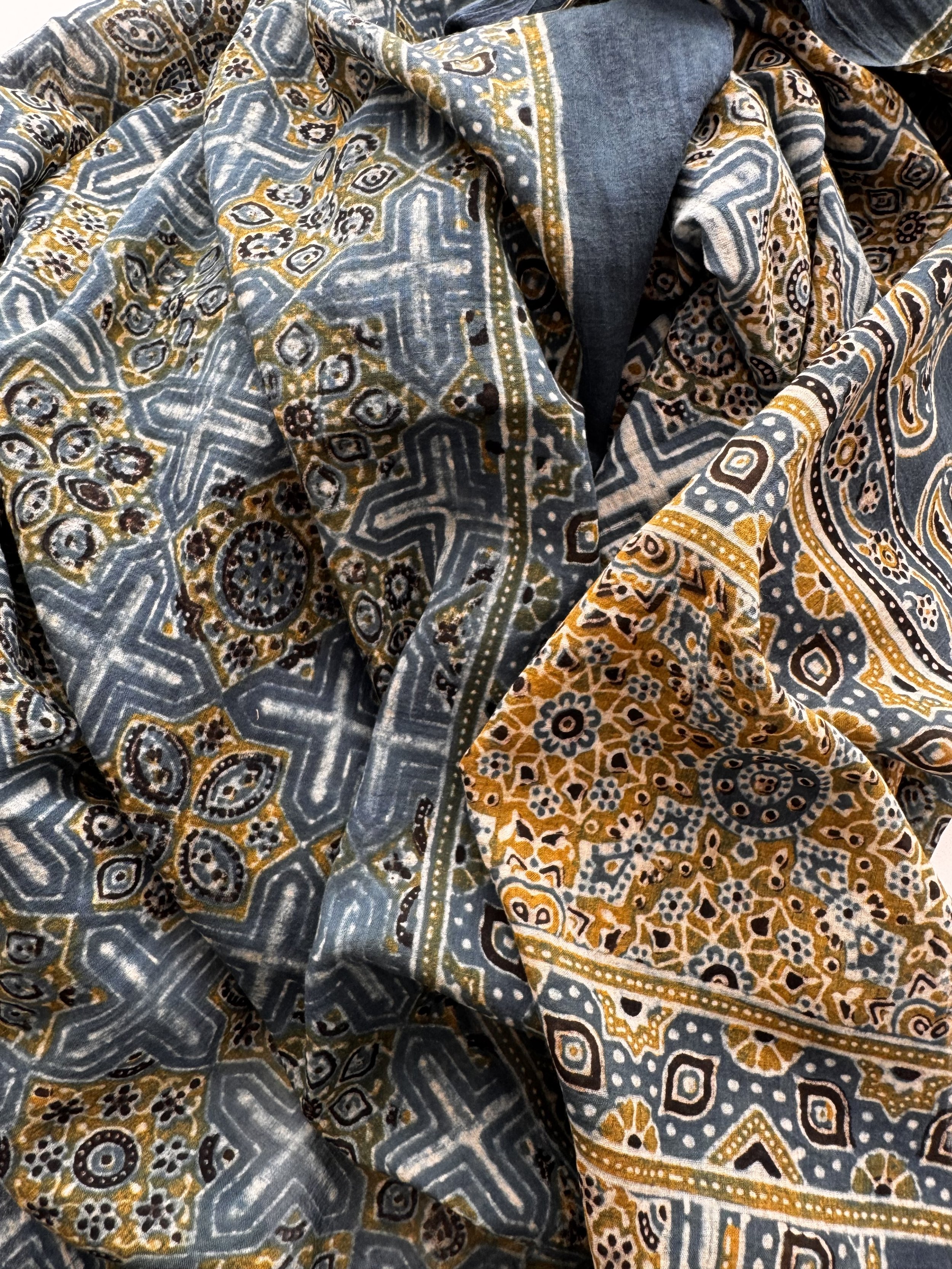 Intricate Ajrakh block print design on naturally dyed cotton scarf