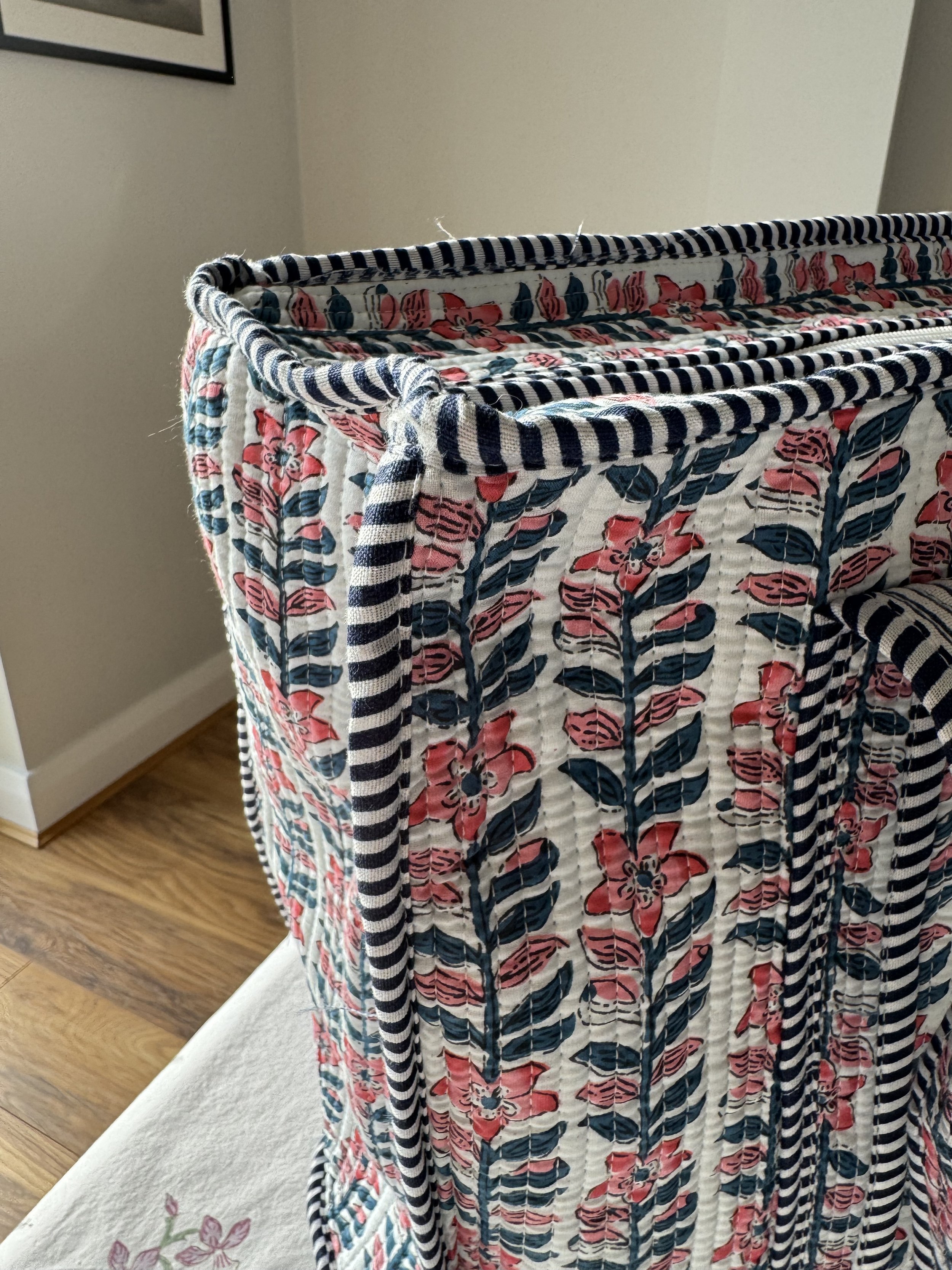 Close up of delicate pink botanical floral vine screen print on white quilted cotton handmade tote bag by Jewelled Buddha