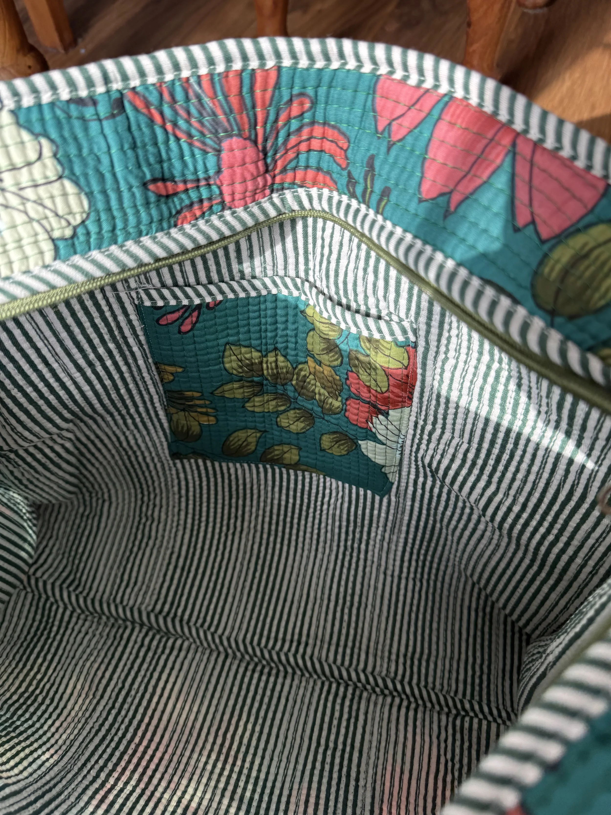 Inside pocket detail on interior of quilted cotton tote shopper bag