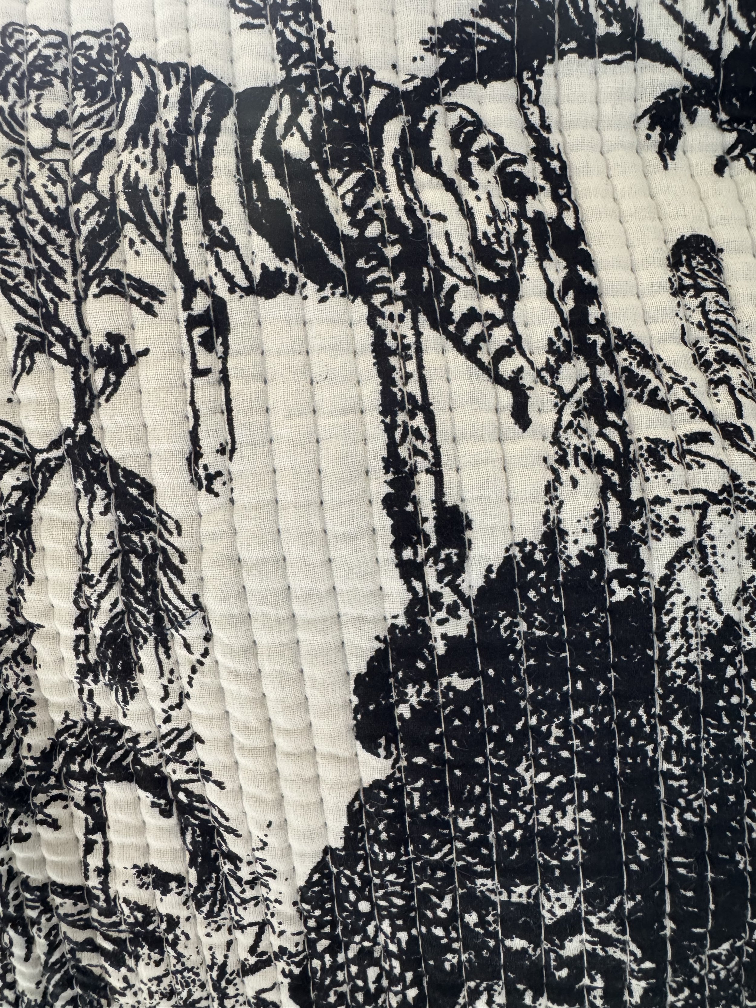 Close up of tiger print in black and white in Toile style on handmade quilted cotton tote bag