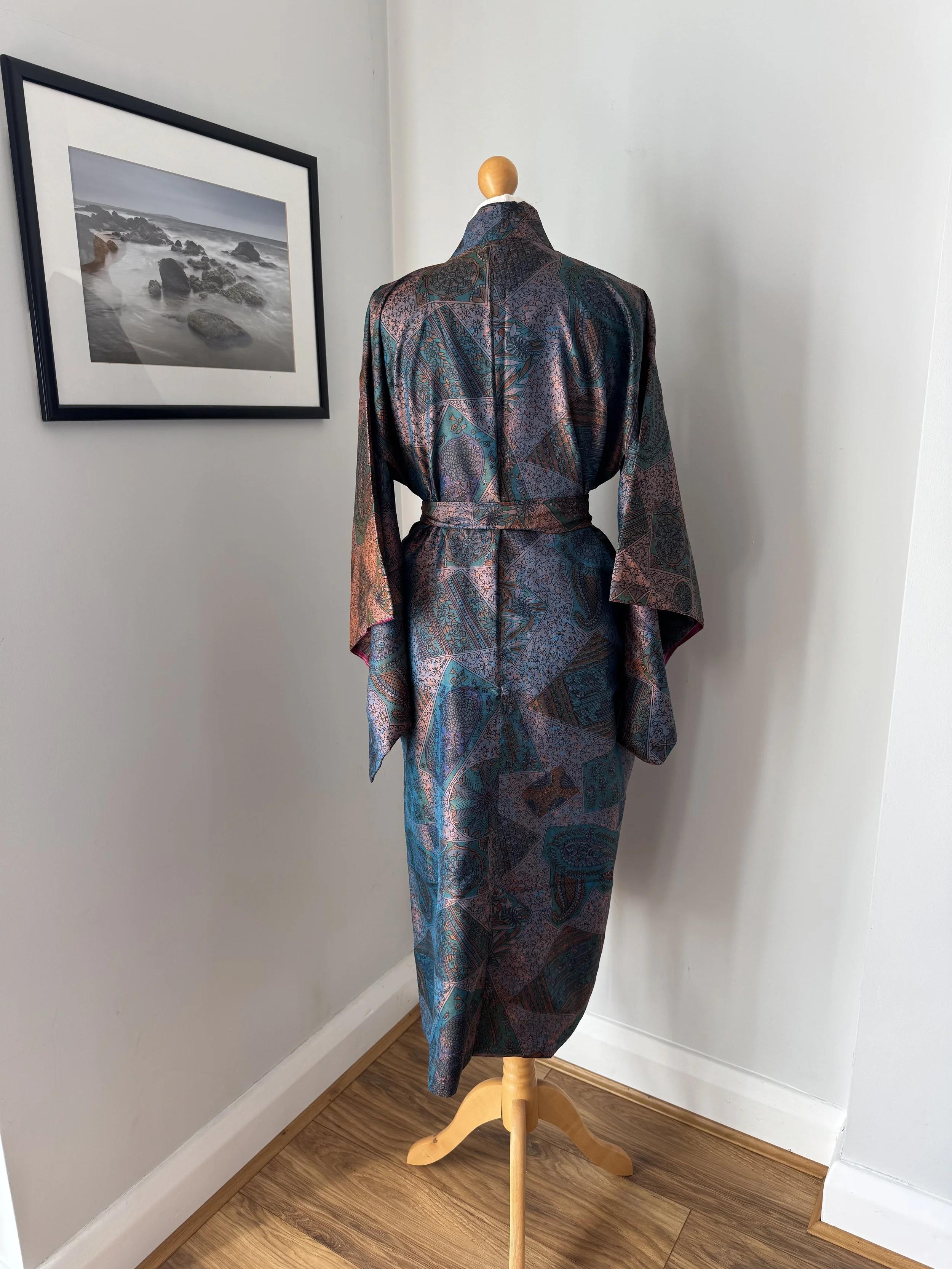 Back view of aubergine patchwork upcycled sari silk kimono robe showing flowing drape and silk tie belt