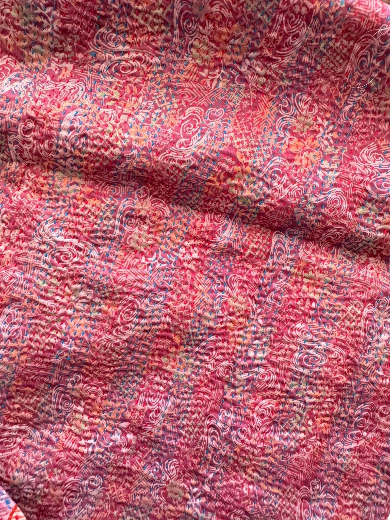 Pink floral print quilted kantha fabric