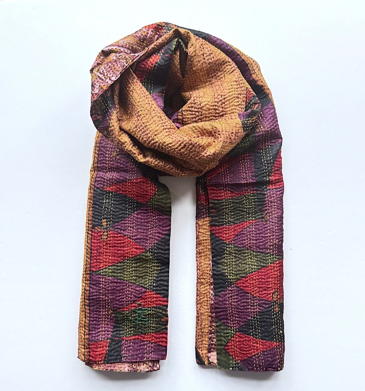 Colourful recycled sari silk Kantha scarf in abstract print on a white background