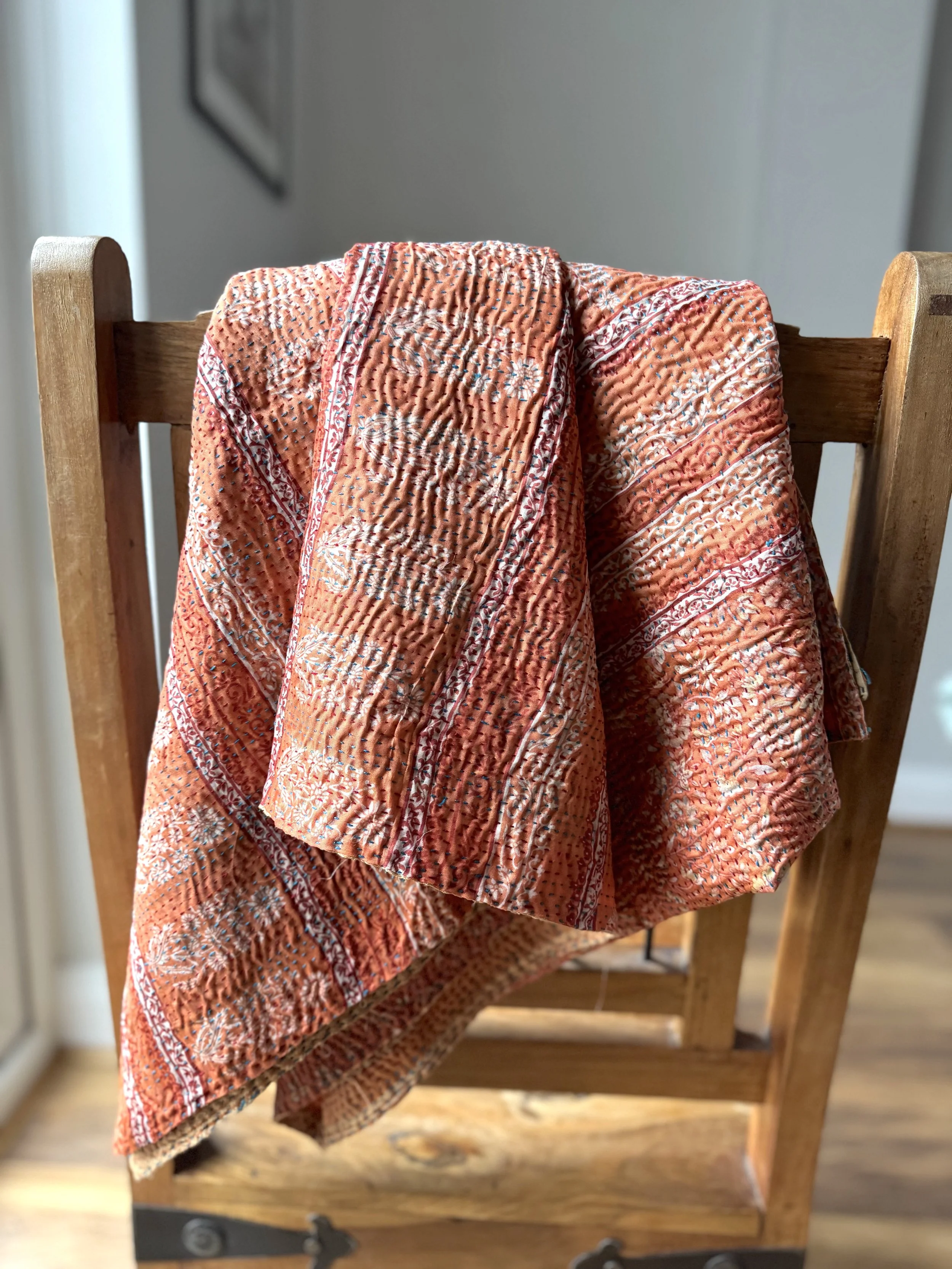 Soft silk summer scarf wrap in shades of peach and beige handmade from recycled sari silk which is embroidered all oever with Kantha stitch by artisans in India