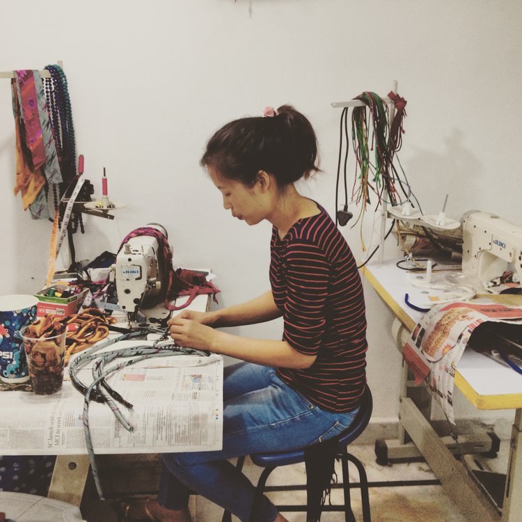 Artisan+making+sari+necklace (1).jpeg