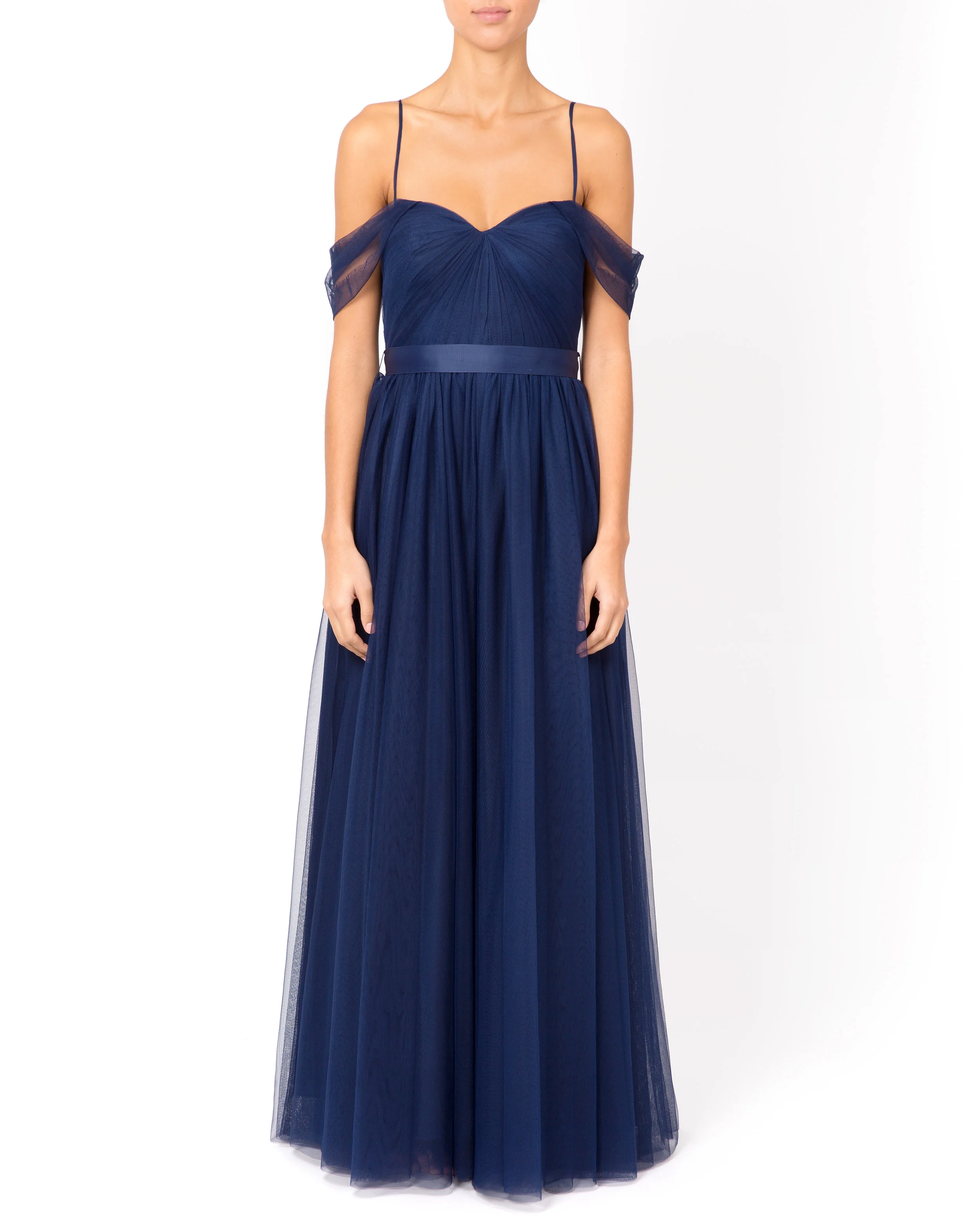 The Bardot dress in navy with spaghetti straps supporting the tulle off-shoulder loops and modern vintage feel.