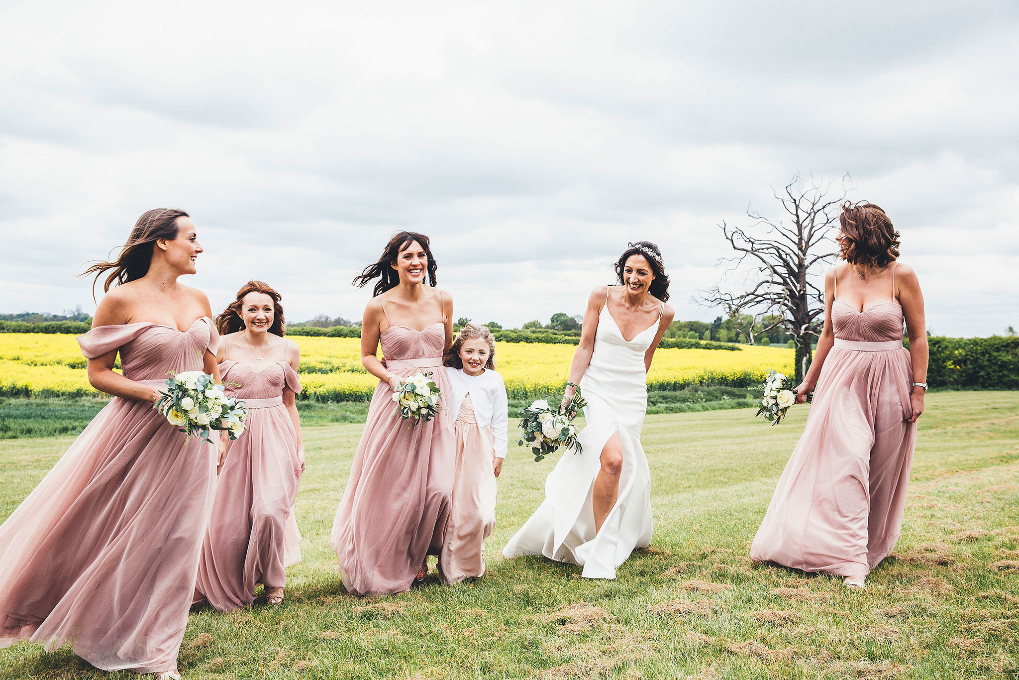 An absolutely gorgeous image of beautiful bride Laura and her girls who wore our Bardot dress in smoked blush. Photo - Leanne Jade Photography