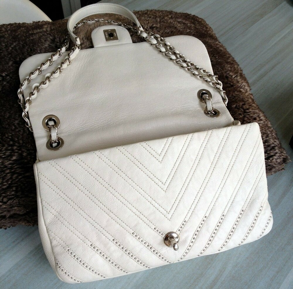 SOLD - 2017 CHANEL Classic Ivory White Chevron Calfskin Silver Studded  Chain L Flap Bag - My Dreamz Closet